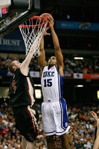 ATLANTA - MARCH 15:  Gerald Henderson #15 of the Duke Blue Devils goes for the dunk against Jordan DeMercy #2 of the Florida State Seminoles during the championship game of the 2009 ACC Men's Basketball Tournament on March 15, 2009 at the Georgia Dome in 