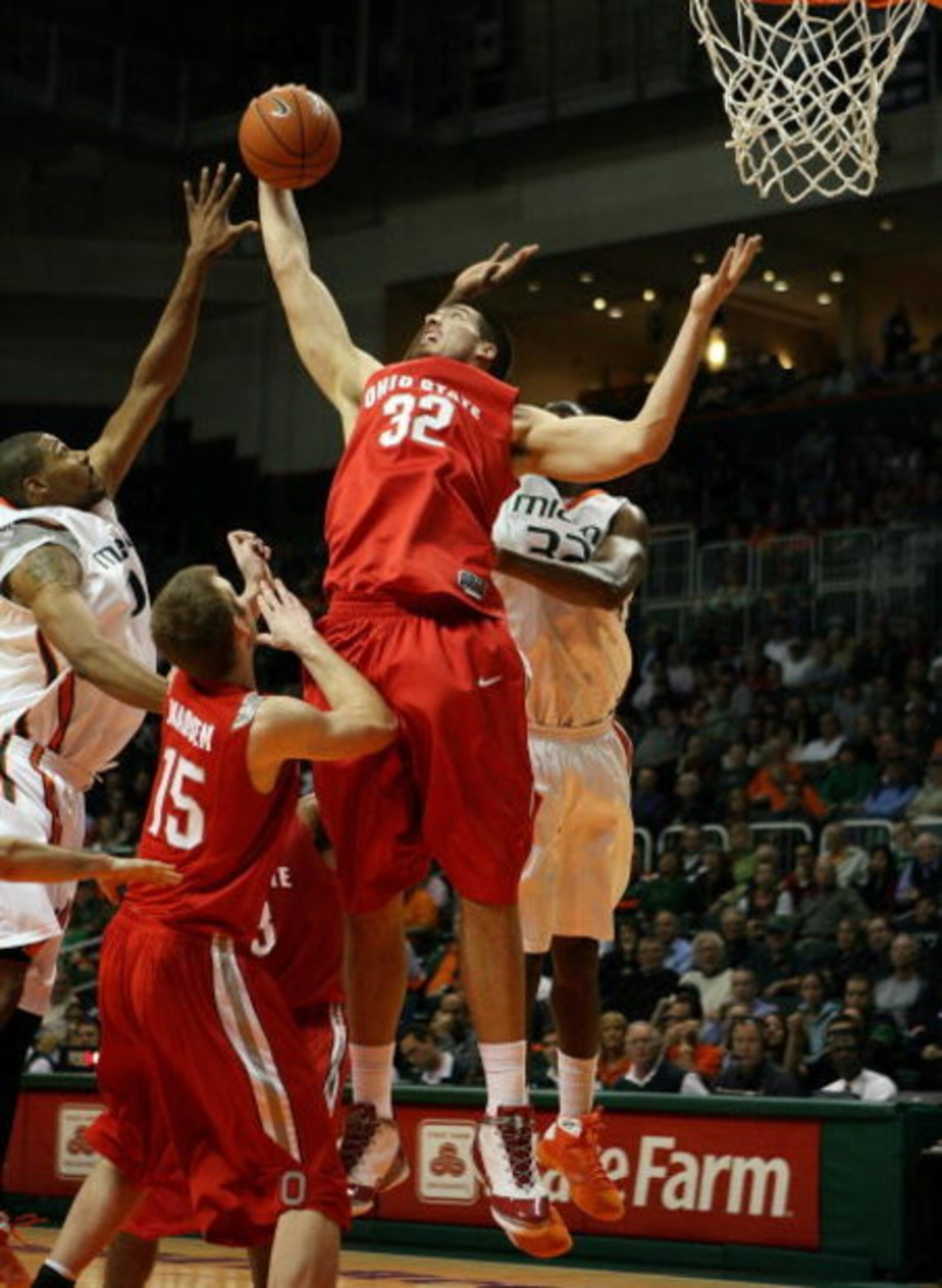 CORAL GABLES, FL - DECEMBER 02: B.J. Mullens #32 of the Ohio State Buckeyes reaches out to grab a rebound against the Miami Hurricanes at BankUnited Center on December 2, 2008 in Coral Gables, Florida. Ohio State defeated Miami 73-68. (Photo by Doug Ben CORAL GABLES, FL - DECEMBER 02: B.J. Mullens #32 of the Ohio State Buckeyes reaches out to grab a rebound against the Miami Hurricanes at BankUnited Center on December 2, 2008 in Coral Gables, Florida. Ohio State defeated Miami 73-68. (Photo by Doug Ben