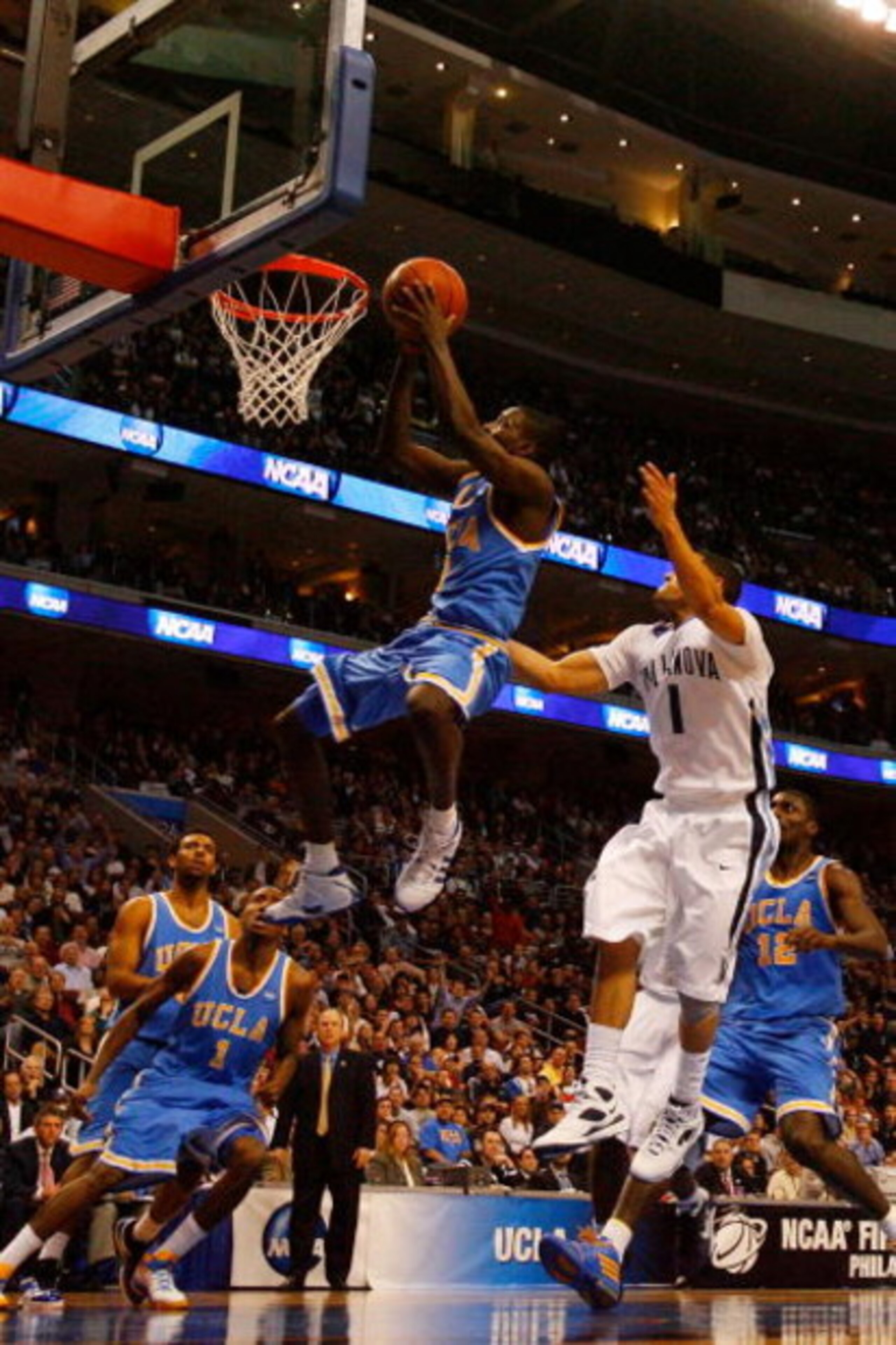PHILADELPHIA - MARCH 21: Darren Collison #2 of the UCLA Bruins shoots against Scottie Reynolds #1 of the Villanova Wildcats during the second round of the NCAA Division I Men's Basketball Tournament at the Wachovia Center on March 21, 2009 in Philadelphi PHILADELPHIA - MARCH 21: Darren Collison #2 of the UCLA Bruins shoots against Scottie Reynolds #1 of the Villanova Wildcats during the second round of the NCAA Division I Men's Basketball Tournament at the Wachovia Center on March 21, 2009 in Philadelphi