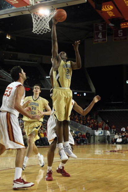 LOS ANGELES - DECEMBER 22:  Gani Lawal #31 of the Georgia Tech Yellow Jackets goes up with the ball against the USC Trojans during the game on December 22, 2008 at the Galen Center in Los Angeles, California. USC won 76-57. (Photo by Stephen Dunn/Getty Im