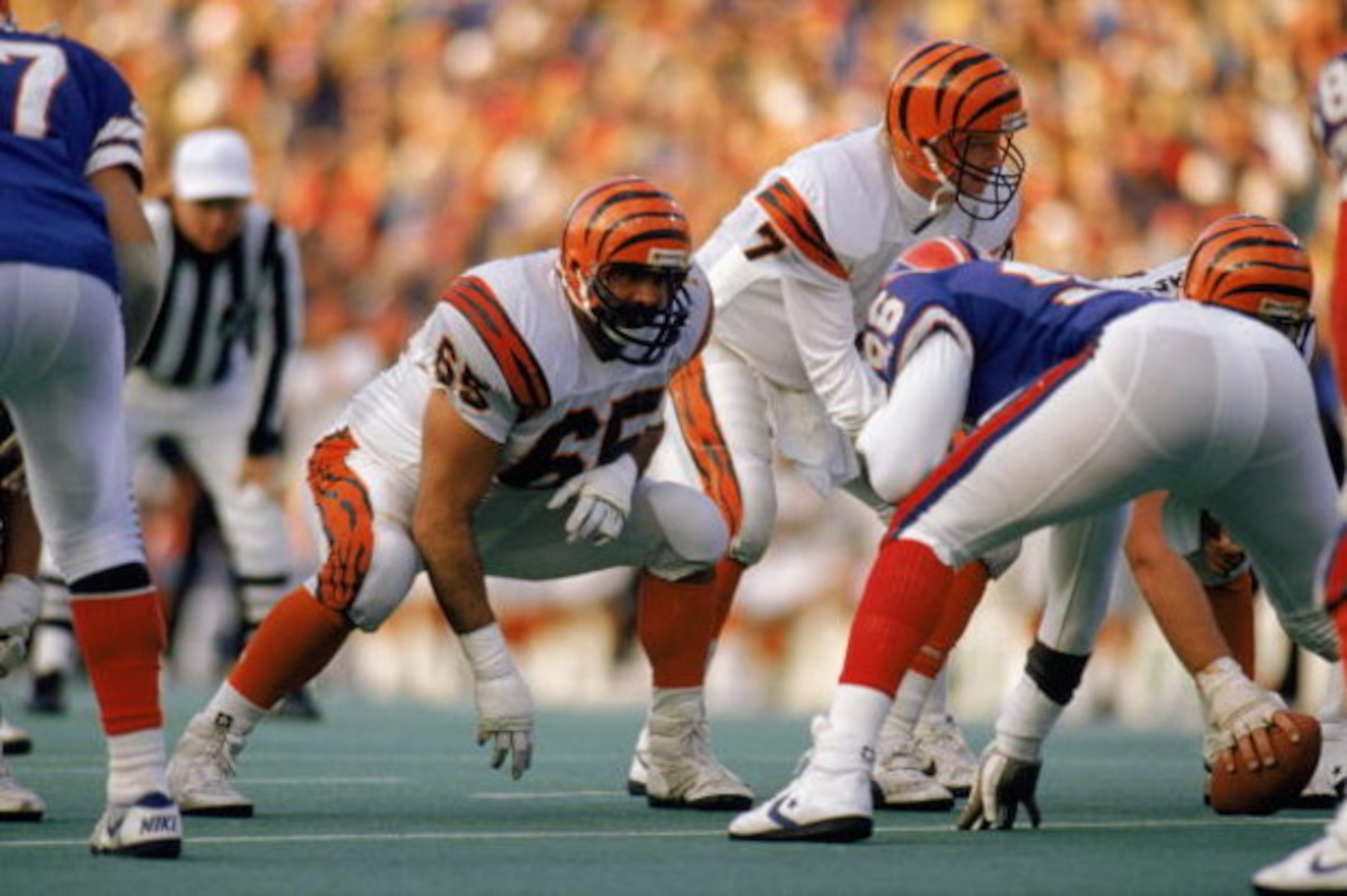 BUFFALO, NY - NOVEMBER 26:  Max Montoya #65 of the Cincinnati Bengals stares down a Buffalo Bills defender during the NFL game at Rich Stadium on November 26, 1989 in Buffalo, New York. The Bills defeated the Bengals 24-7. (Photo by Rick Stewart/Getty Ima