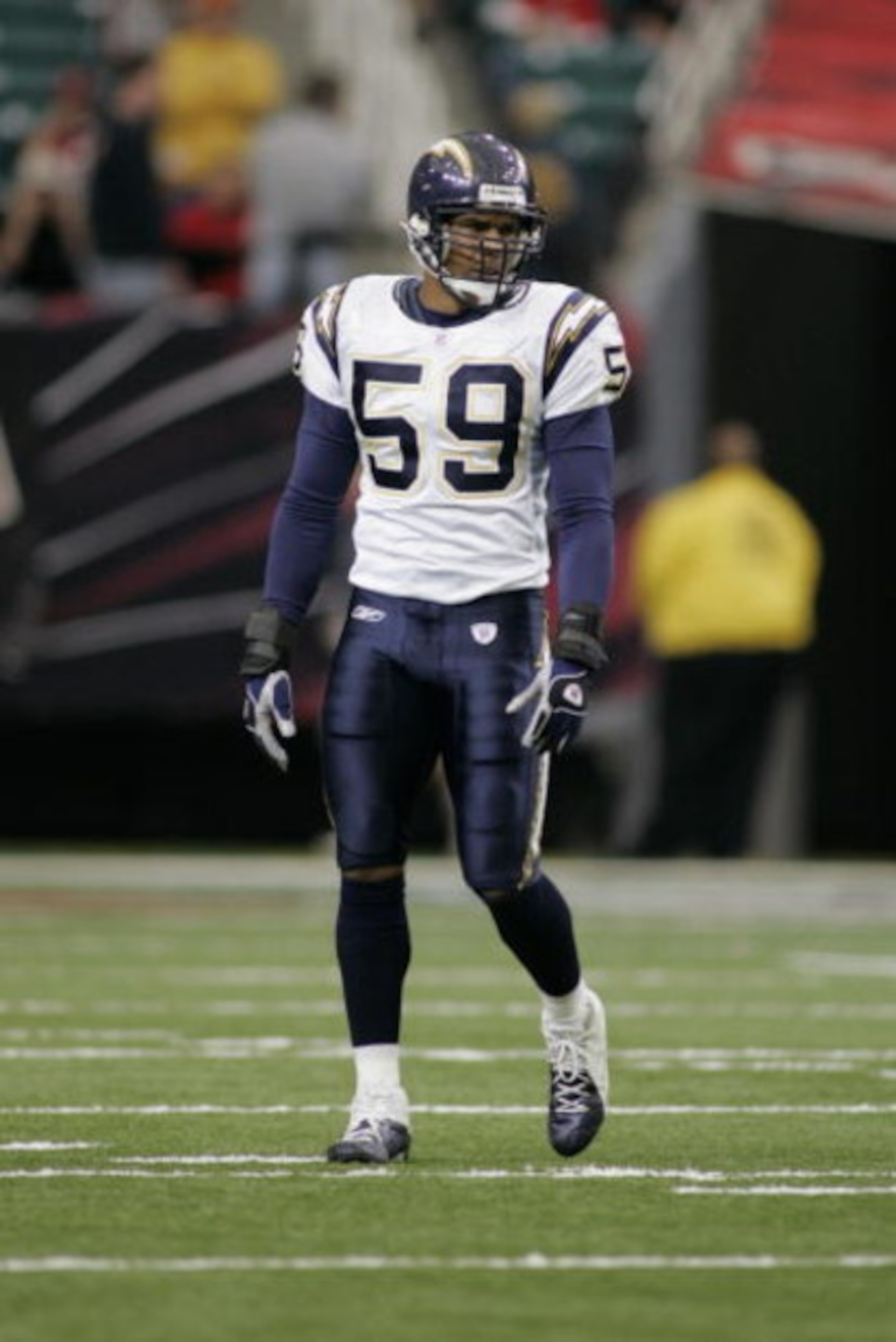 ATLANTA - OCTOBER 17:  Linebacker Donnie Edwards #59 of the San Diego Chargers gets into position during the game against the Atlanta Falcons on October 17, 2004 at the Georgia Dome in Atlanta, Georgia. The Falcons defeated the Chargers 21-20. (Photo By G
