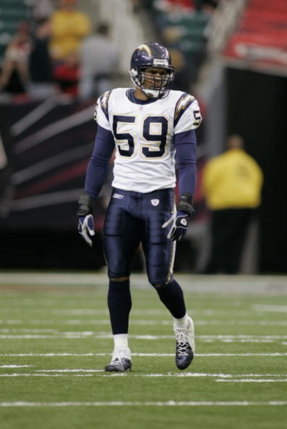 ATLANTA - OCTOBER 17: Linebacker Donnie Edwards #59 of the San Diego Chargers gets into position during the game against the Atlanta Falcons on October 17, 2004 at the Georgia Dome in Atlanta, Georgia. The Falcons defeated the Chargers 21-20. (Photo By G ATLANTA - OCTOBER 17: Linebacker Donnie Edwards #59 of the San Diego Chargers gets into position during the game against the Atlanta Falcons on October 17, 2004 at the Georgia Dome in Atlanta, Georgia. The Falcons defeated the Chargers 21-20. (Photo By G