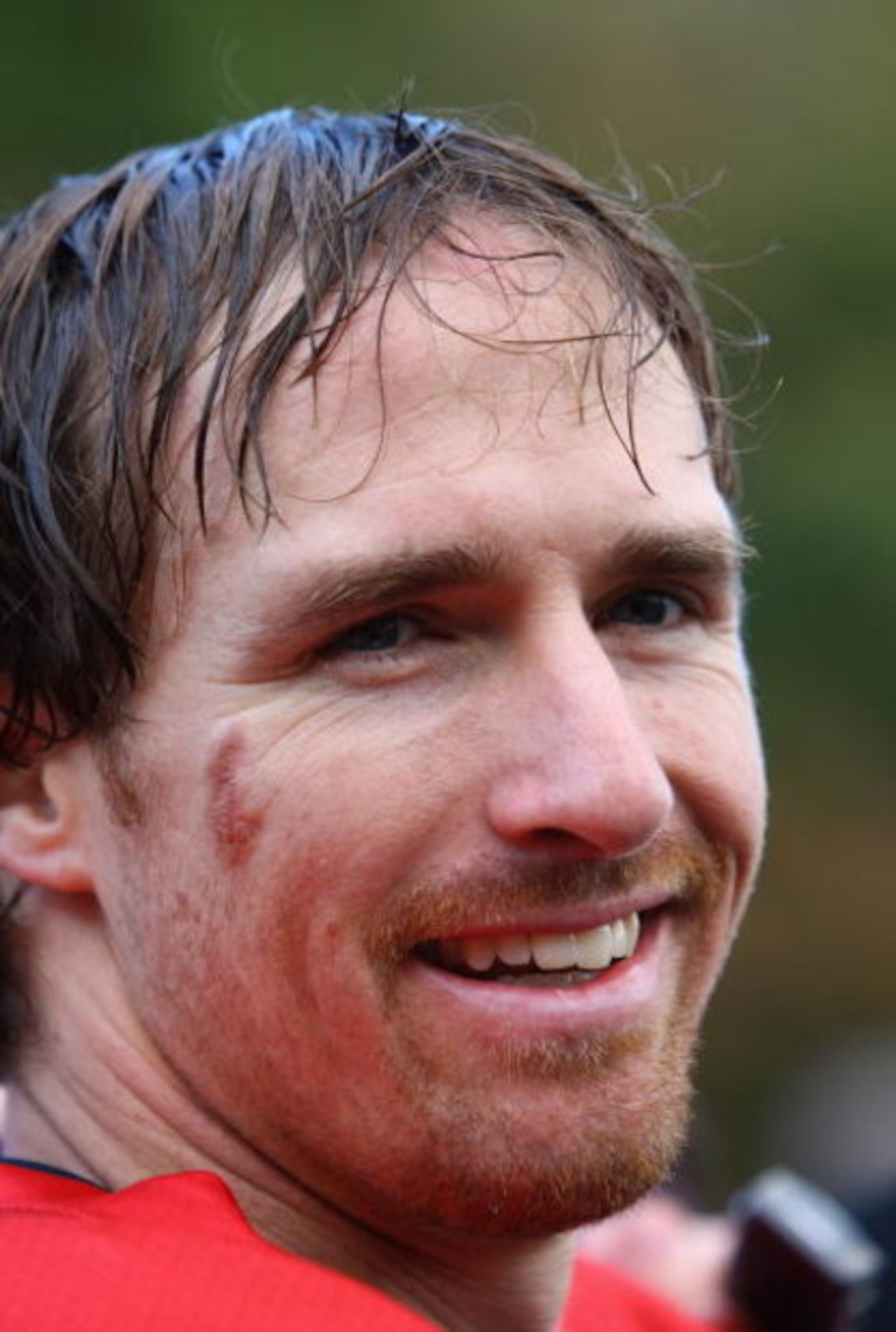 CHANDLER'S CROSS, UNITED KINGDOM - OCTOBER 22:  Drew Brees of New Orleans Saints talks to the media after a training session at The Grove Hotel on October 22, 2008 in Chandler's Cross, England.The NFL match between New Orleans Saints and San Diego Charger