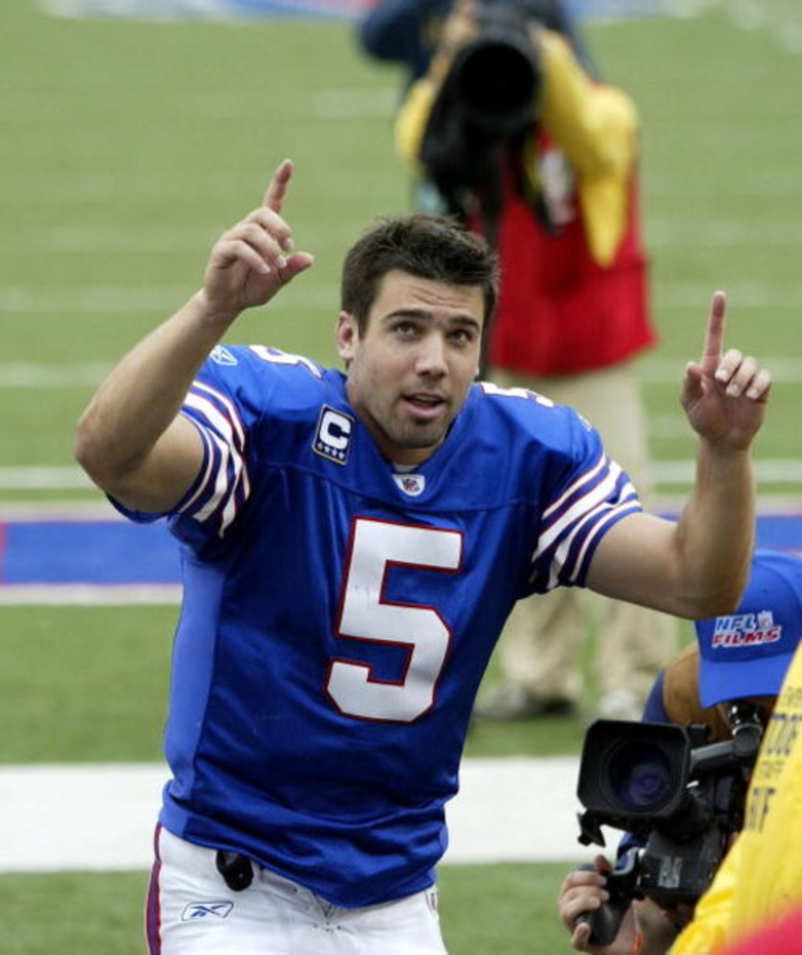 ORCHARD PARK, NY - SEPTEMBER 21: Trent Edwards #5 of the Buffalo Bills acknowledges fans as he runs off the field after defeating the Oakland Raiders on September 21, 2008 at Ralph Wilson Stadium in Orchard Park, New York. Buffalo won 24-23.   (Photo by R
