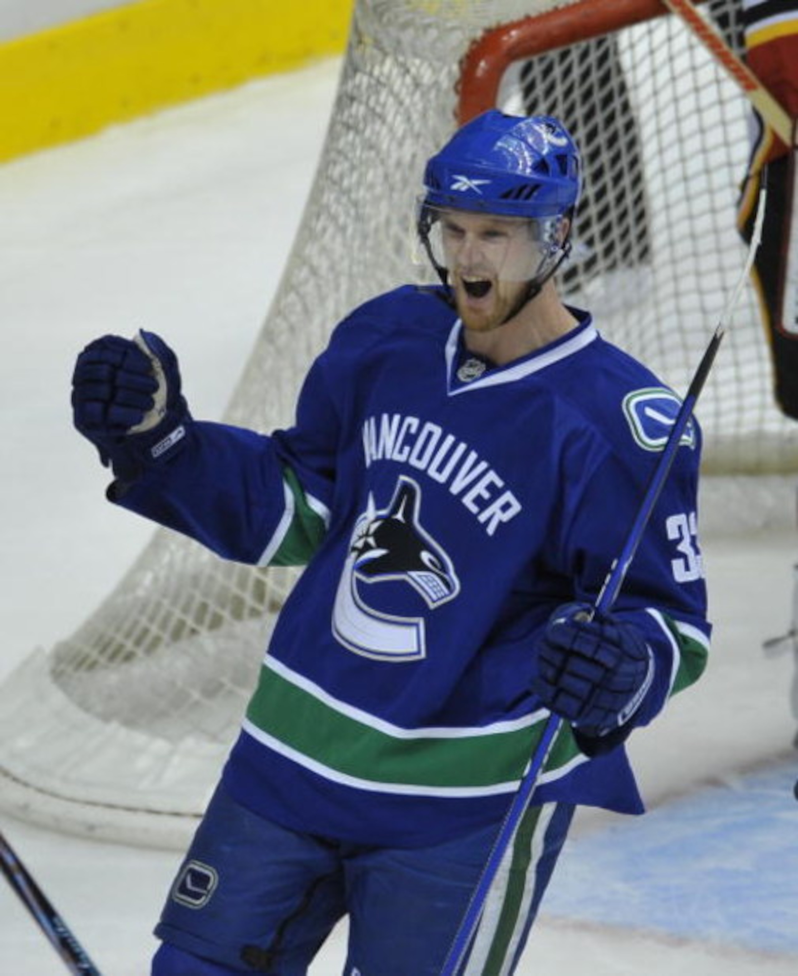 VANCOUVER, CANADA - APRIL 7: Henrik Sedin #33 of the Vancouver Canucks celebrates his goal during their game against Calgary Flames at General Motors Place April 7, 2009 in Vancouver, Canada. (Photo by Nick Didlick/Getty Images) VANCOUVER, CANADA - APRIL 7: Henrik Sedin #33 of the Vancouver Canucks celebrates his goal during their game against Calgary Flames at General Motors Place April 7, 2009 in Vancouver, Canada. (Photo by Nick Didlick/Getty Images)