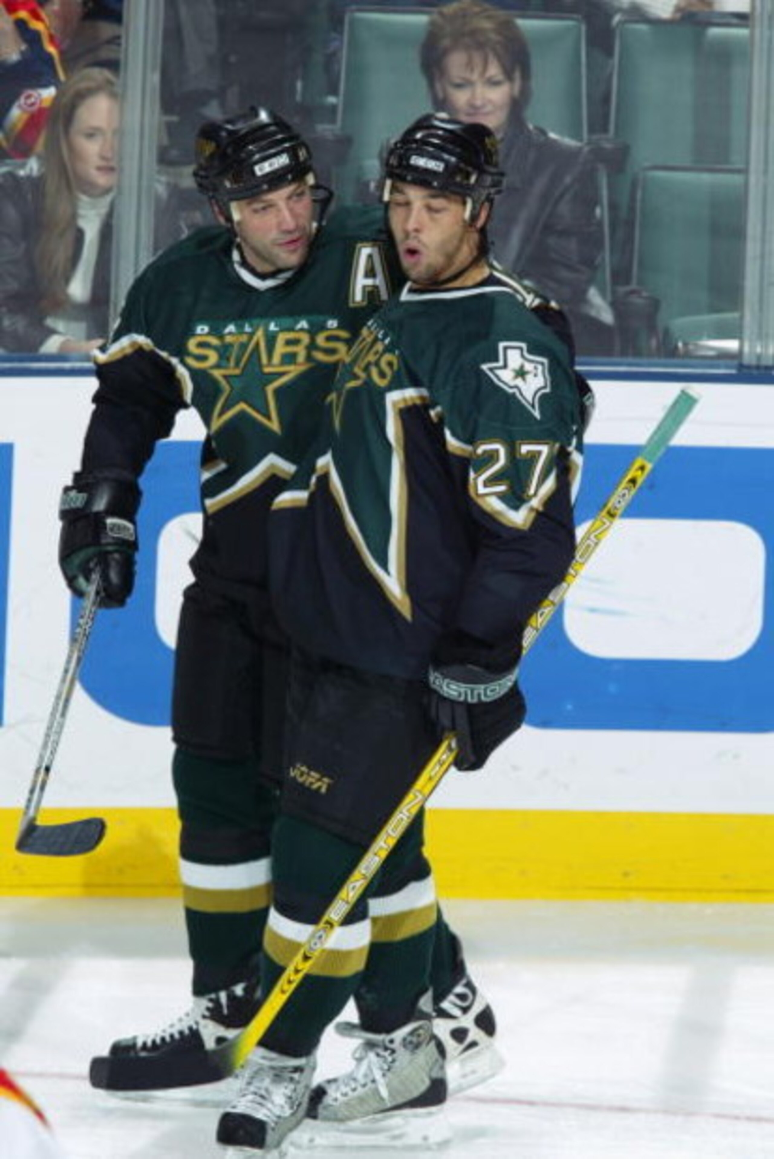 SUNRISE, FL - DECEMBER. 27: Manny Malhorta #27 of the Dallas Stars celebrates his goal with teammate Bill Guerin #13 during the NHL game against the Florida Panthers at the Office Depot Center on December 27, 2002 in Sunrise, Florida. The Stars won 4-0. SUNRISE, FL - DECEMBER. 27: Manny Malhorta #27 of the Dallas Stars celebrates his goal with teammate Bill Guerin #13 during the NHL game against the Florida Panthers at the Office Depot Center on December 27, 2002 in Sunrise, Florida. The Stars won 4-0.