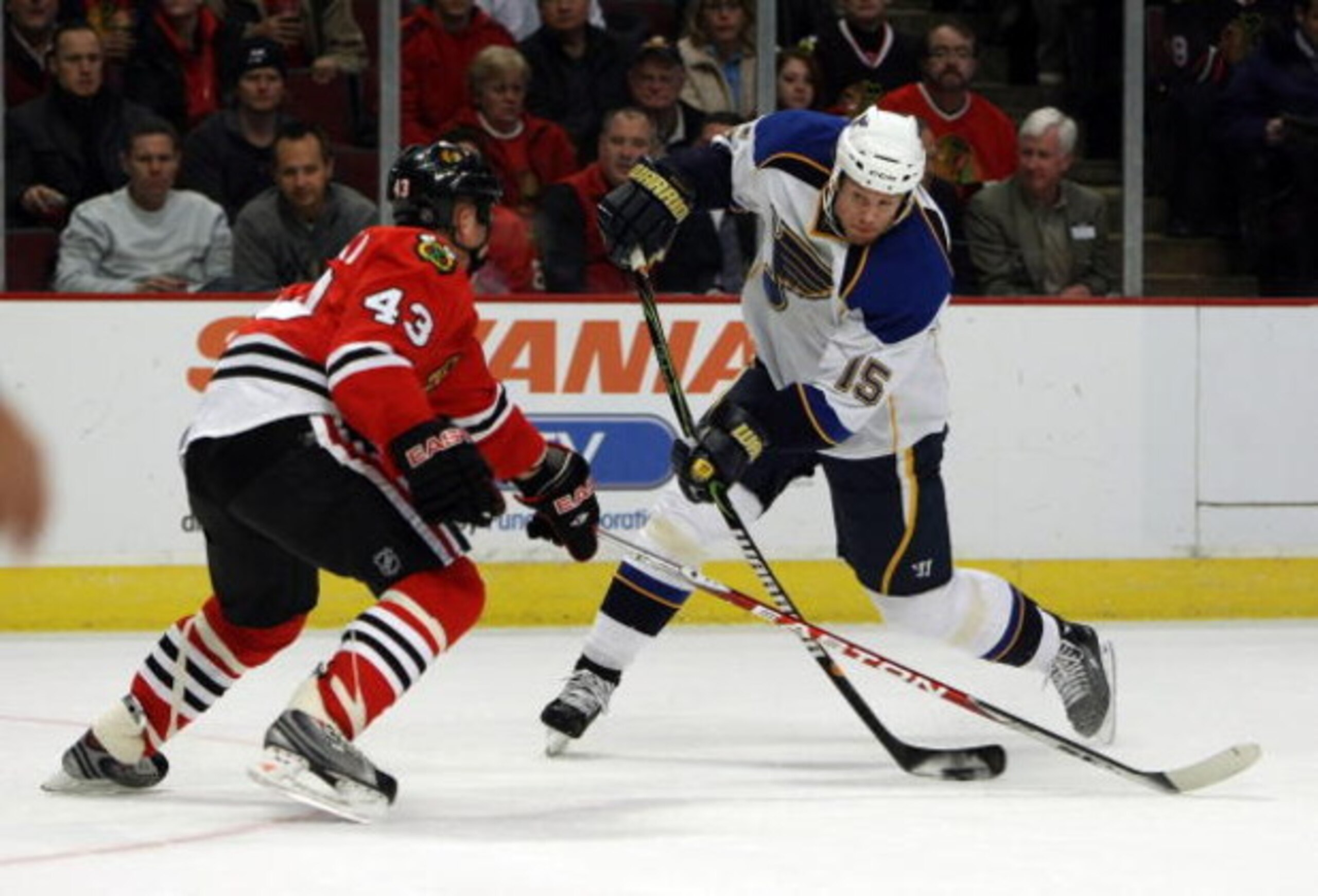 CHICAGO - JANUARY 21: Brad Winchester #15 of the St. Louis Blues fires a shot against James Wisniewski #43 of the Chicago Blackhawks on January 21, 2009 at the United Center in Chicago, Illinois. (Photo byJonathan Daniel/Getty Images) CHICAGO - JANUARY 21: Brad Winchester #15 of the St. Louis Blues fires a shot against James Wisniewski #43 of the Chicago Blackhawks on January 21, 2009 at the United Center in Chicago, Illinois. (Photo byJonathan Daniel/Getty Images)