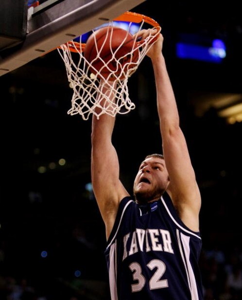 BOSTON - MARCH 26:  Kenny Frease #32 of the Xavier Musketeers dunks against the Pittsburgh Panthers during the NCAA Men's Basketball Tournament East Regionals at TD Banknorth Garden on March 26, 2009 in Boston, Massachusetts.  (Photo by Elsa/Getty Images)