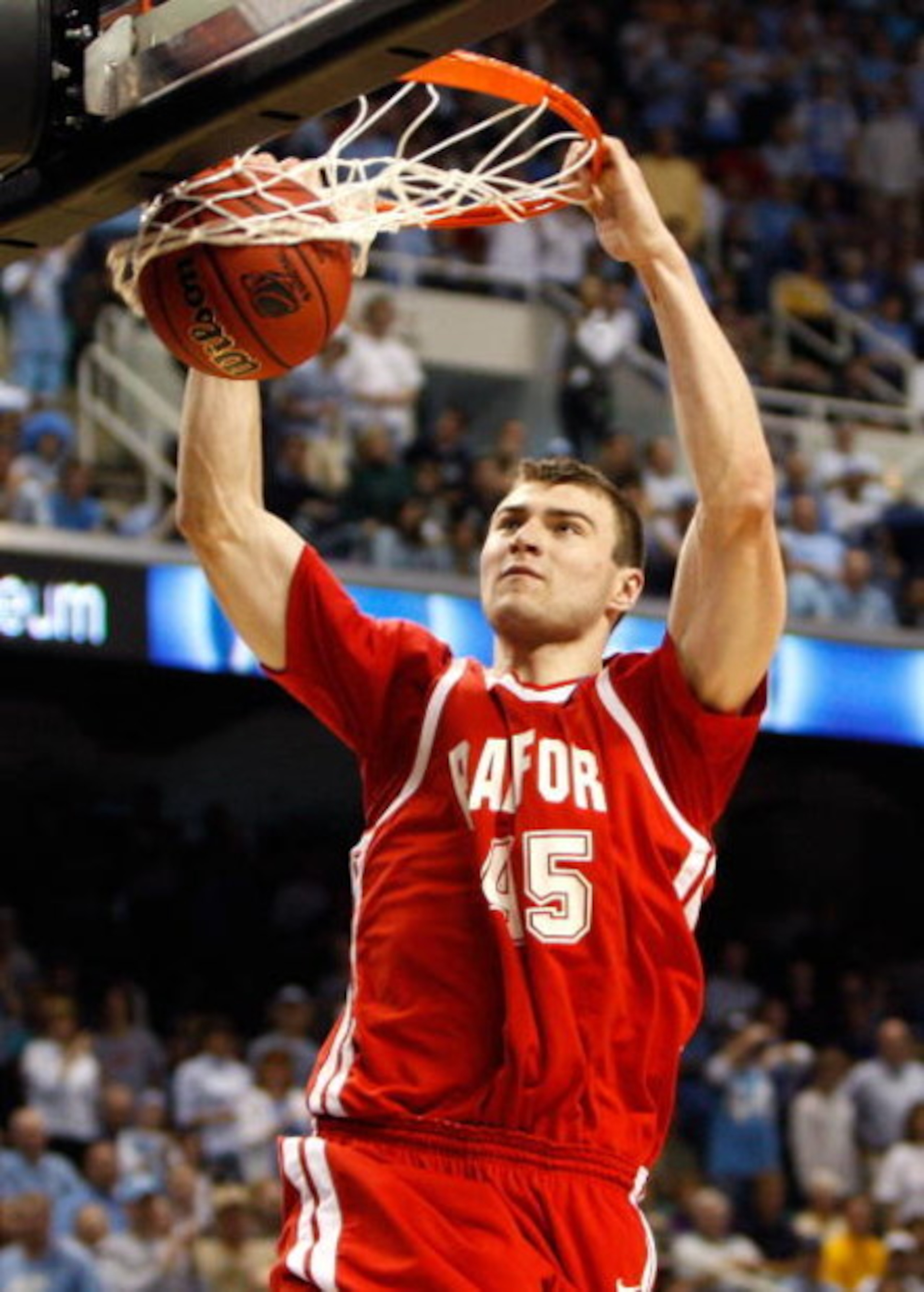 GREENSBORO, NC - MARCH 19:  Artsiom Parakhouski #45 of the Radford Highlanders dunks against the North Carolina Tar Heels during the first round of the NCAA Division I Men's Basketball Tournament at the Greensboro Coliseum on March 19, 2009 in Greensboro,