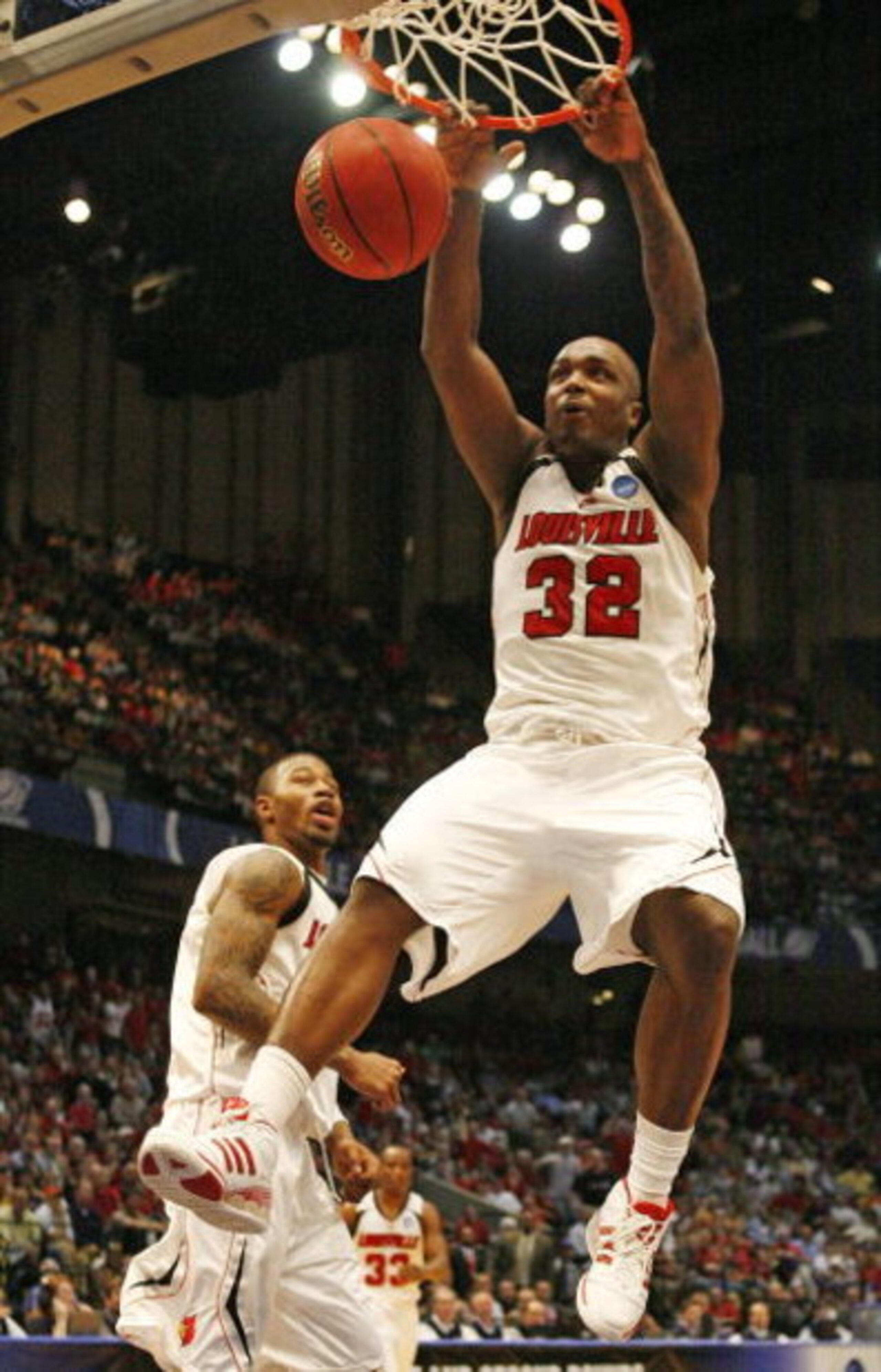 BIRMINGHAM, AL - MARCH 21: Derrick Caracter #32 of the Louisville Cardinals dunks the ball during the first round of the East Regional as part of the 2008 NCAA Men's Basketball Tournament at the Birmingham-Jefferson Civic Center on March 21, 2008 in Birmi