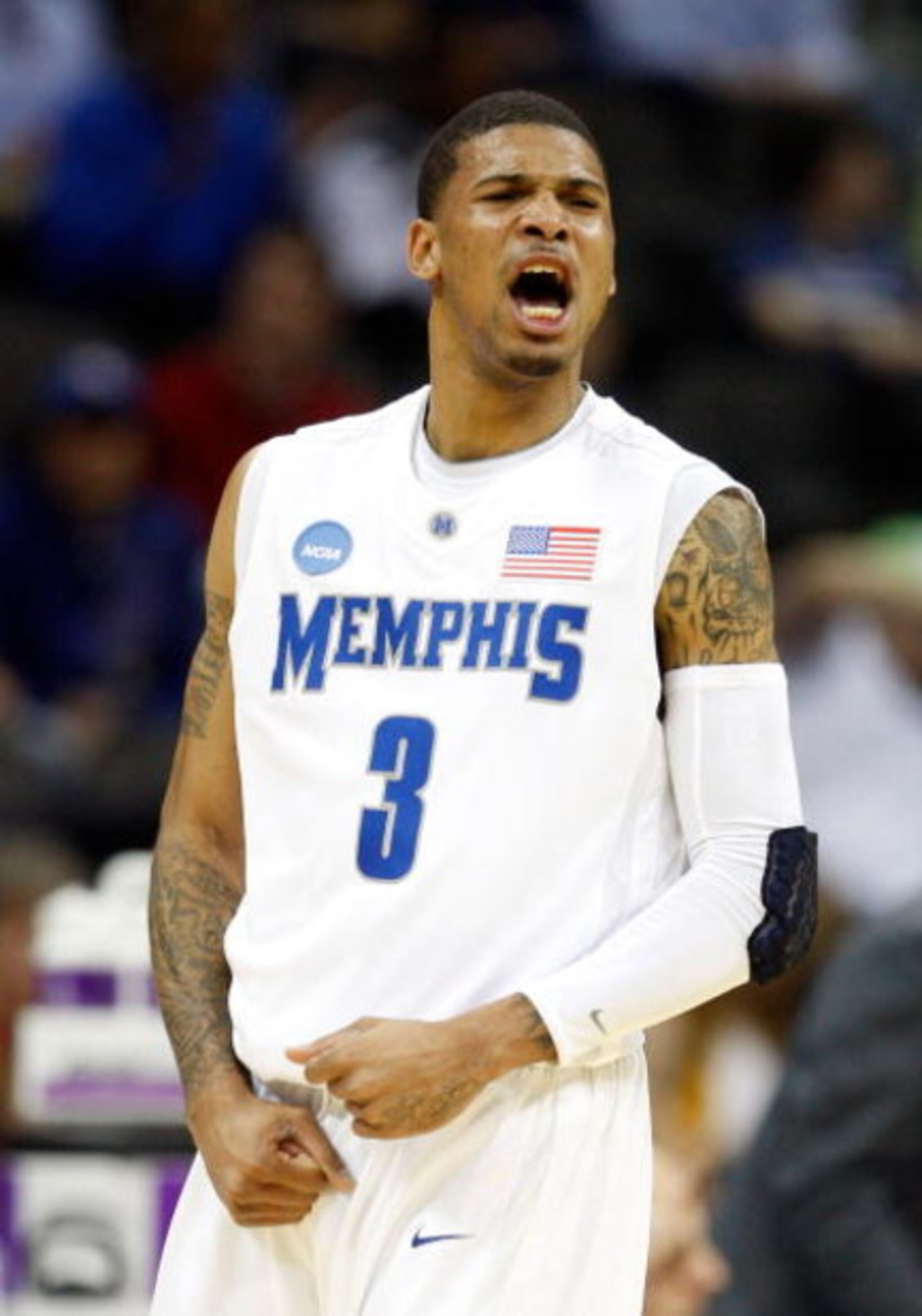 KANSAS CITY, MO - MARCH 19:  Roburt Sallie #3 of the Memphis Tigers reacts after making a three-point shot in the first half against the CSUN Matadors during the first round of the NCAA Division I Men's Basketball Tournament at the Sprint Center on March 