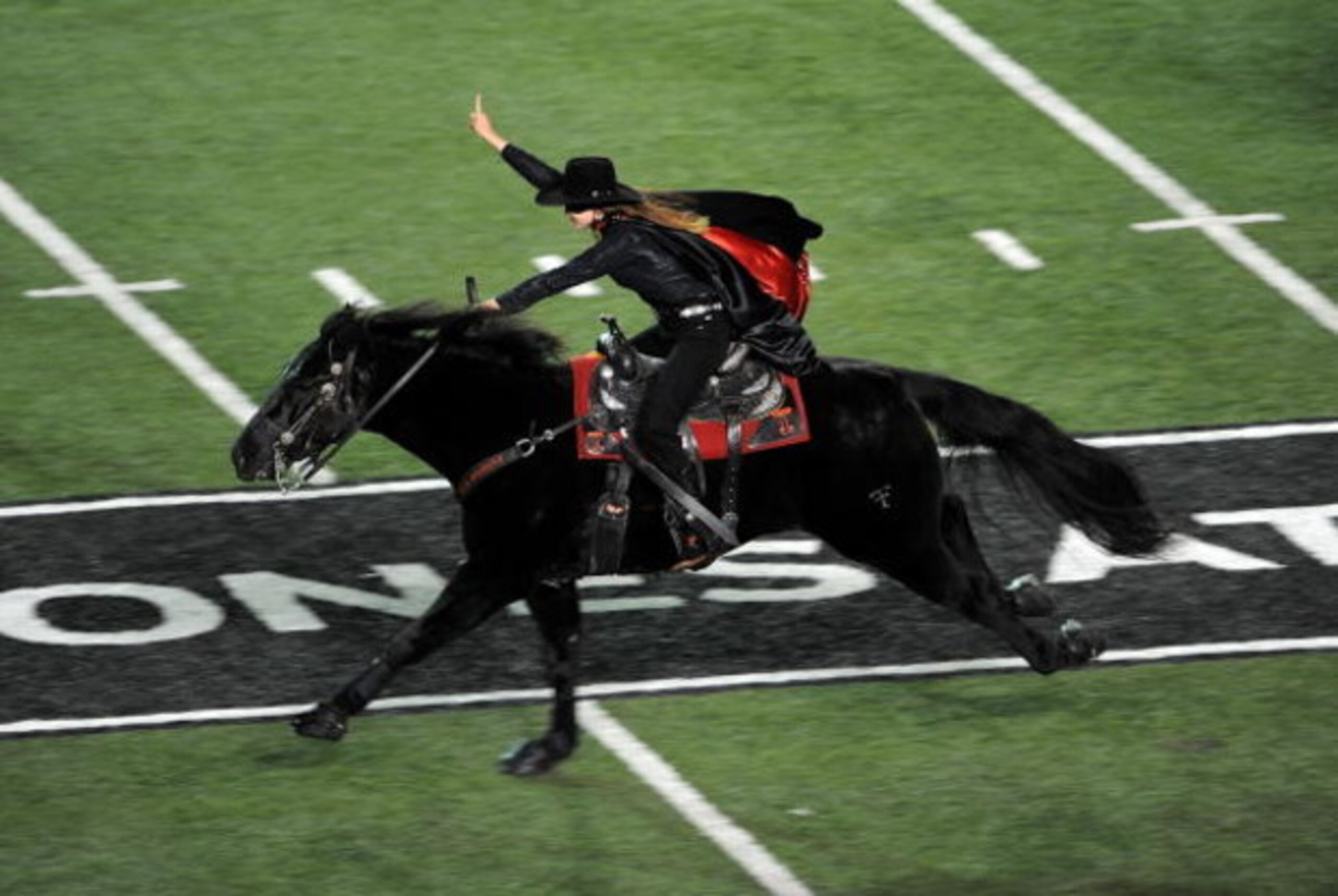 LUBBOCK, TX - NOVEMBER 08:  The Texas Tech Red Raiders Masked Rider during a game against the Oklahoma State Cowboys at Jones AT&T Stadium on November 8, 2008 in Lubbock, Texas.  (Photo by Ronald Martinez/Getty Images)
