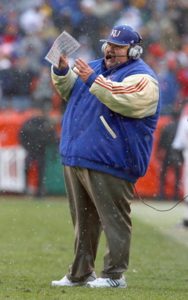 KANSAS CITY, MO - NOVEMBER 29:  Head coach Mark Mangino of the Kansas Jayhawks watches the action during the game against the Missouri Tigers on November 29, 2008 at Arrowhead Stadium in Kansas City, Missouri. (Photo by Jamie Squire/Getty Images)