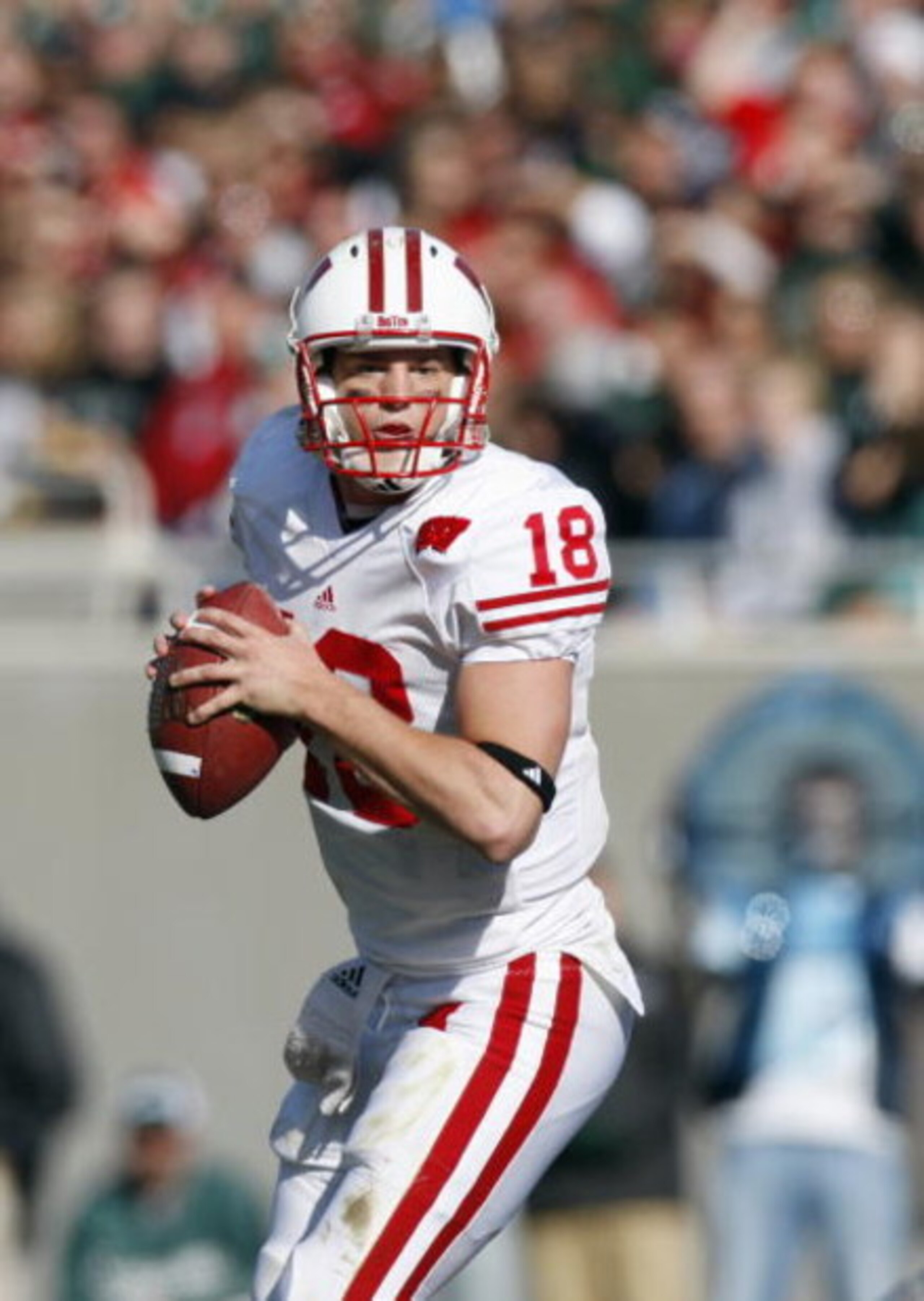 EAST LANSING - NOVEMBER 1:  Quarterback Dustin Sherer #18 of the  Wisconsin Badgers looks to pass the ball during the game against the Michigan State Spartans at Spartan Stadium on November 1, 2008 in East Lansing, Michigan. (Photo by: Gregory Shamus/Gett