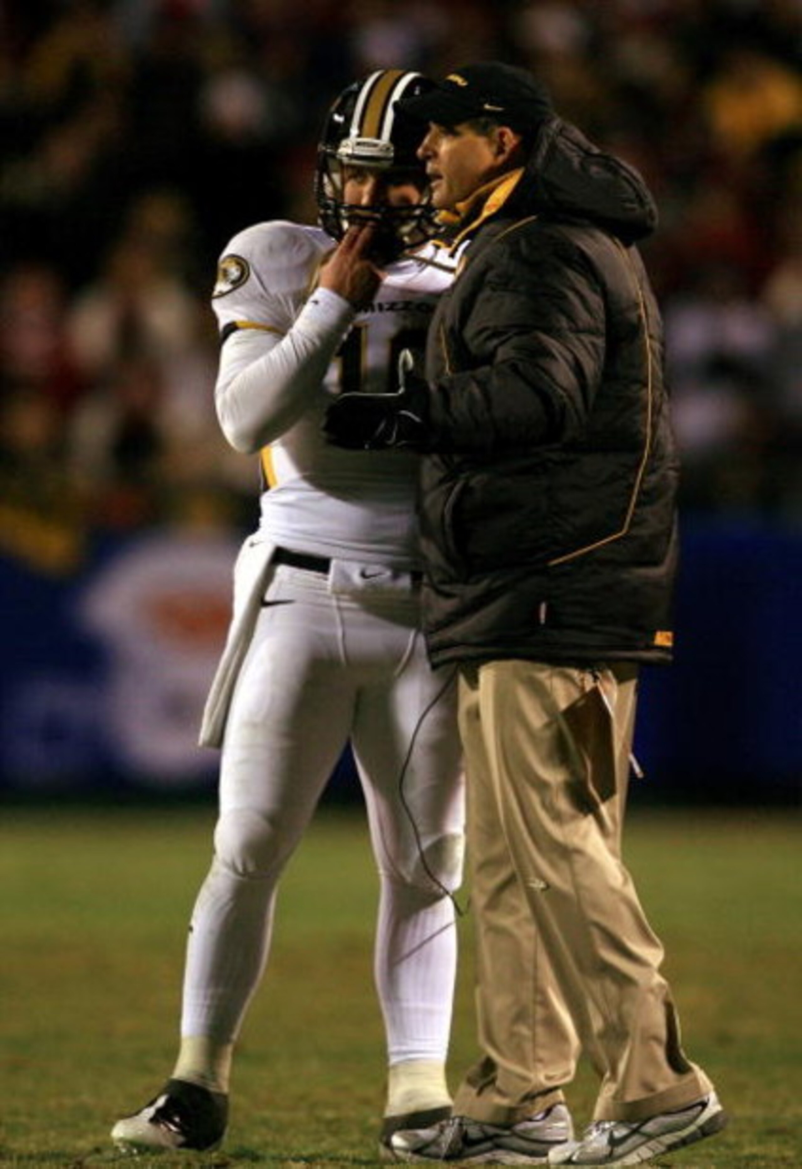 KANSAS CITY, MO - DECEMBER 06:  Head coach Gary Pinkel of the Missouri Tigers talks with quarterback Chase Daniel #10 during the first half of the game against the Oklahoma Sooners on December 6, 2008 at Arrowhead Stadium in Kansas City, Missouri.  (Photo