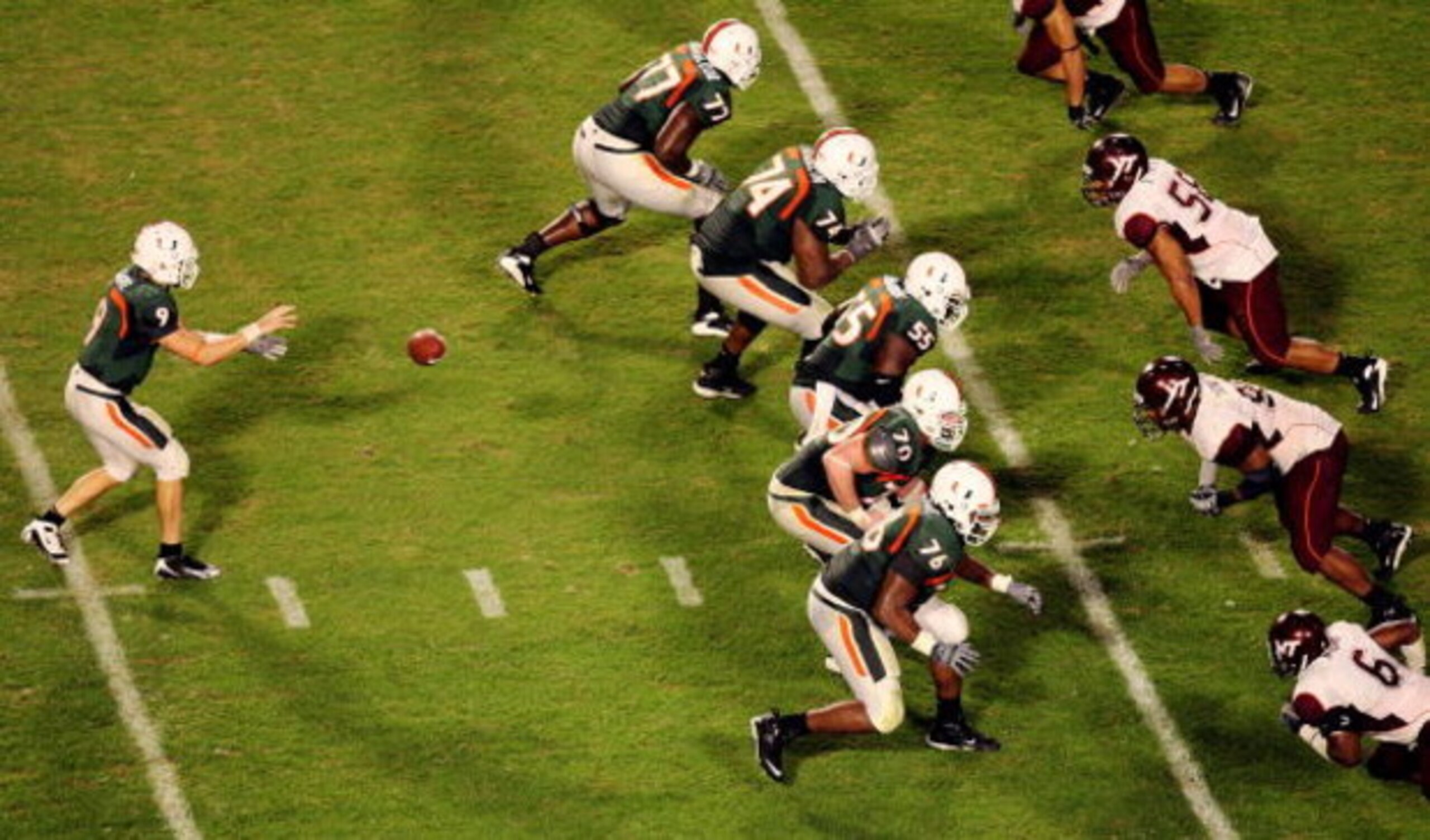 MIAMI - NOVEMBER 13:  Quarterback Robert Marve #9 of the Miami Hurricanes takes a snap in the third quarter while taking on the Virginia Tech Hokies at Dolphin Stadium on November 13, 2008 in Miami, Florida. Miami defeated Virginia Tech 16-14.  (Photo by 