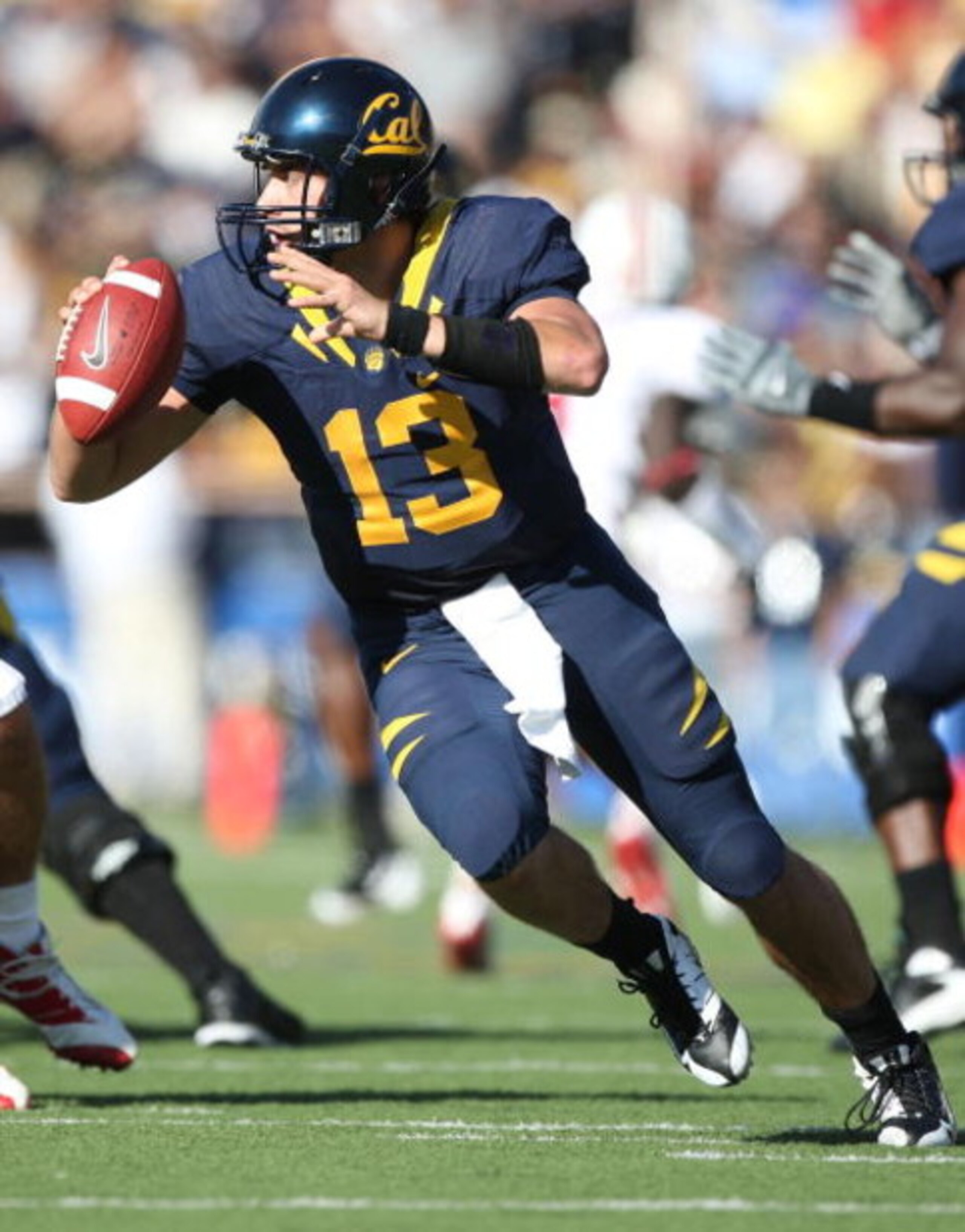 BERKELEY, CA - NOVEMBER 22:  Kevin Riley #13 of the California Golden Bears passes against the Stanford Cardinal during an NCAA football game on November 22, 2008 at Memorial Stadium in Berkeley, California.  (Photo by Jed Jacobsohn/Getty Images)