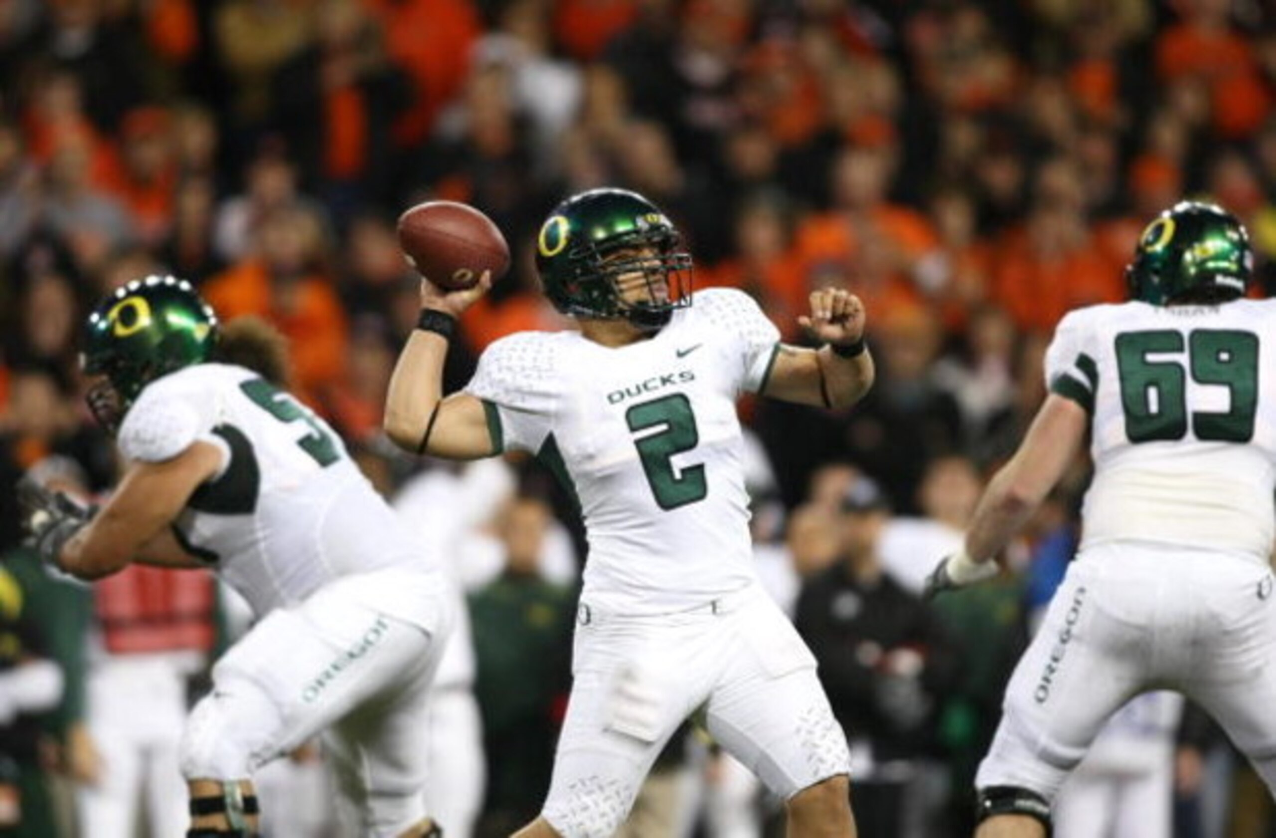 CORVALIS, OR - NOVEMBER 29:  Quarterback Jeremiah Masoli #2 of the Oregon Ducks looks to make a pass play during their game against the Oregon State Beavers at Reser Stadium on November 29, 2008 in Corvalis, Oregon. The Ducks defeated the Beavers 65-38. (