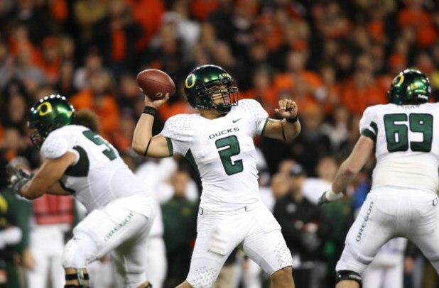 CORVALIS, OR - NOVEMBER 29:  Quarterback Jeremiah Masoli #2 of the Oregon Ducks looks to make a pass play during their game against the Oregon State Beavers at Reser Stadium on November 29, 2008 in Corvalis, Oregon. The Ducks defeated the Beavers 65-38. (