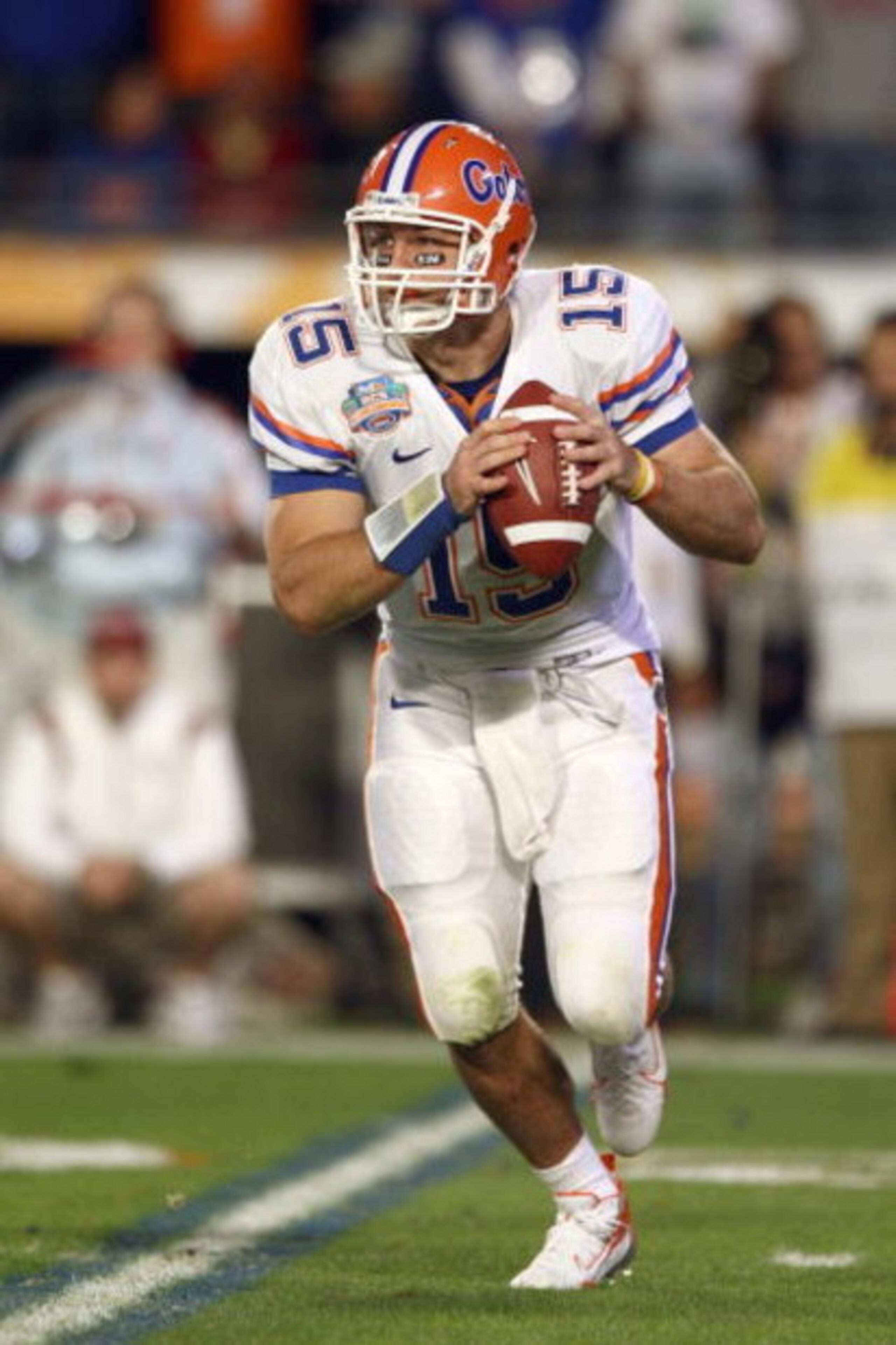 MIAMI - JANUARY 08:  Quarterback Tim Tebow #15 of the Florida Gators moves to pass the ball during the FedEx BCS National Championship Game against the Oklahoma Sooners at Dolphin Stadium on January 8, 2009 in Miami, Florida.  (Photo by Donald Miralle/Get