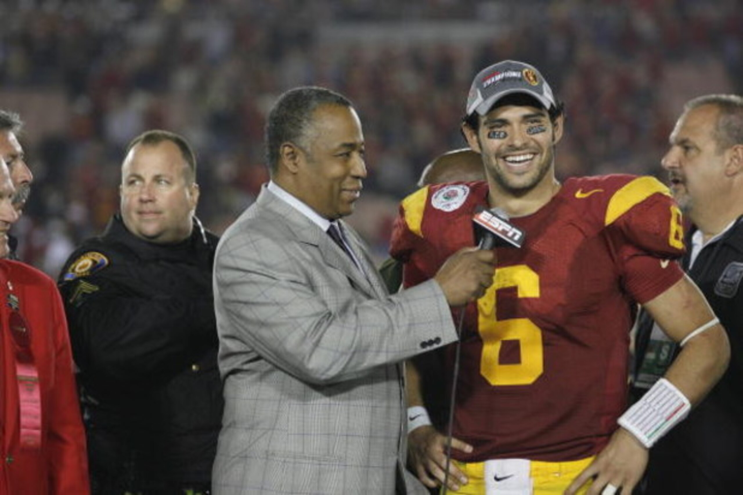 PASADENA, CA - JANUARY 1:  Mark Sanchez #6 of the USC Trojans smiles as he is interviewed by John Saunders of ABC after the game against the Penn State Nittany Lions on January 1, 2009 at the Rose Bowl in Pasadena, California.  USC won 38-24.  (Photo by J
