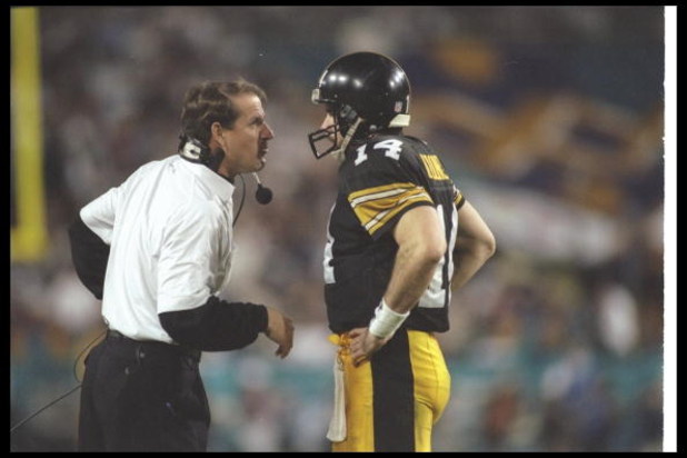 28 Jan 1996:  Pittsburgh Steelers head coach Bill Cowher confers with quarterback Neil O'Donnell during Super Bowl XXX against the Dallas Cowboys at Sun Devil Stadium in Tempe, Arizona.  The Cowboys won the game, 27-17. Mandatory Credit: Mike Powell  /All