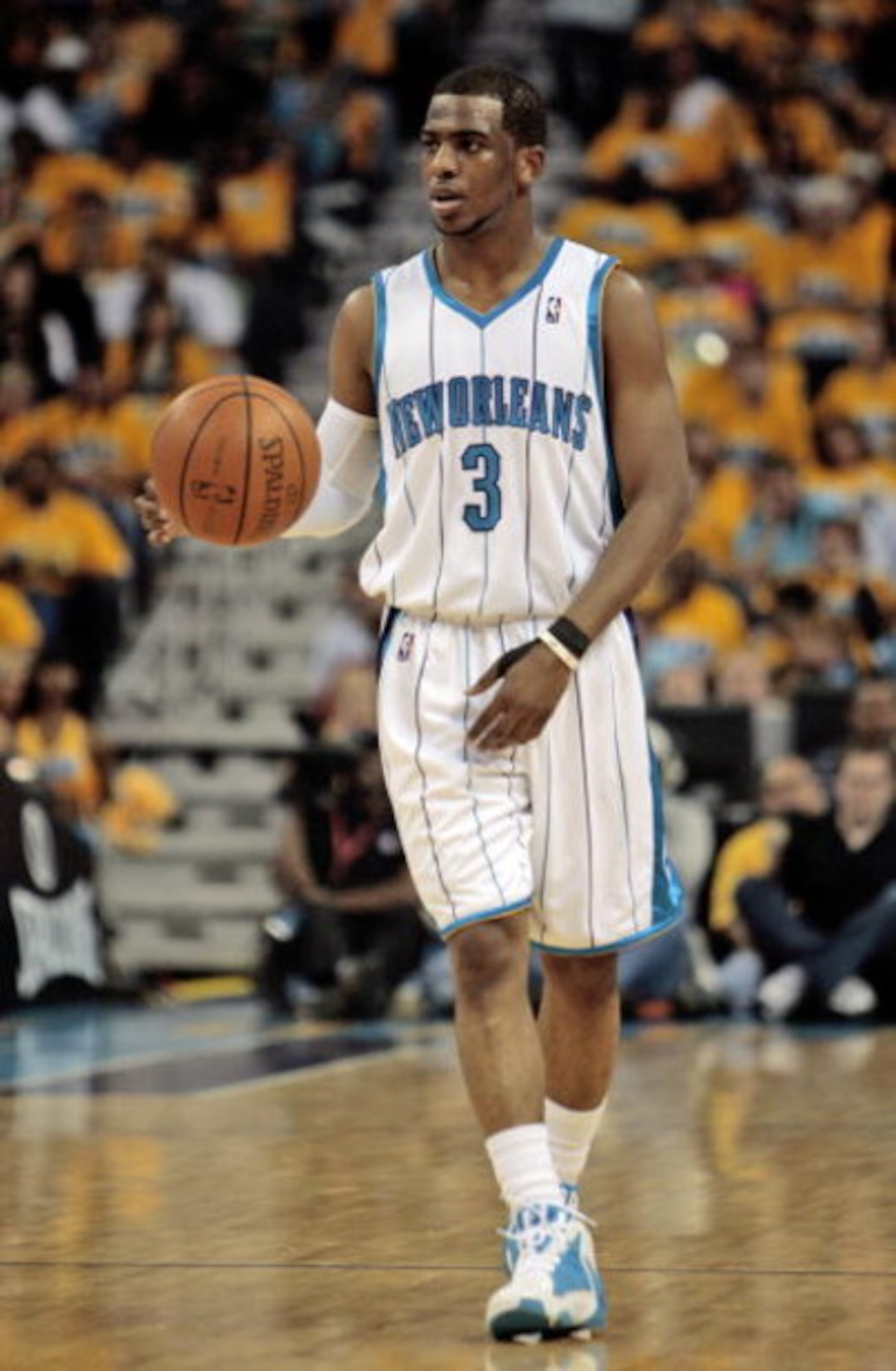 NEW ORLEANS - APRIL 25:  Chris Paul #3 of the New Orleans Hornets brings the ball up court during Game Three of the Western Conference Quarterfinals against the Denver Nuggets during the 2009 NBA Playoffs at New Orleans Arena on April 25, 2009 in New Orle