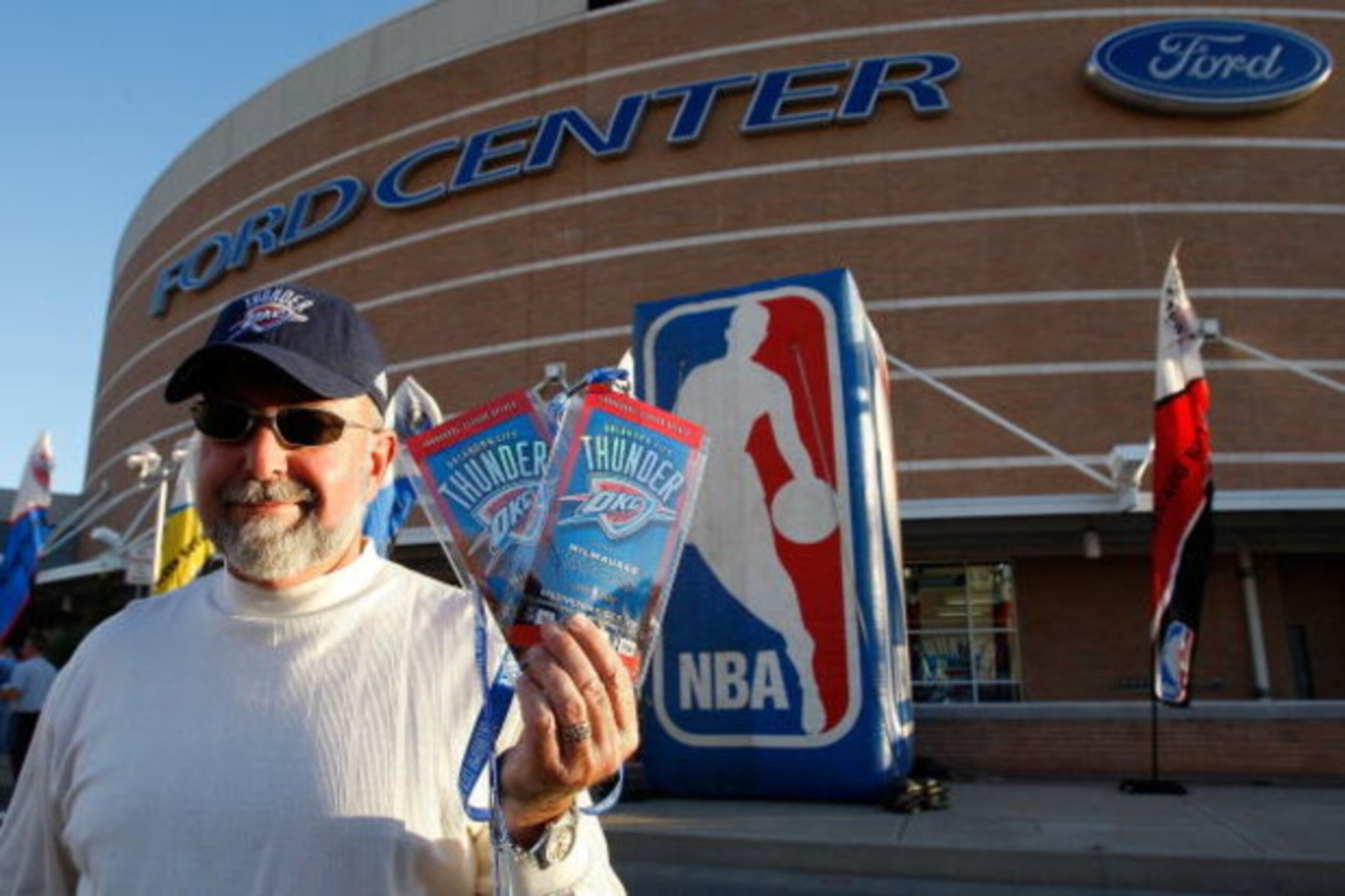 OKLAHOMA CITY - OCTOBER 29:  A fan poses with tickets to opening night between the Milwaukee Bucks and the Oklahoma City Thunder at the Ford Center on October 29, 2008 in Oklahoma City, Oklahoma. The Bucks won 98-87.  NOTE TO USER: User expressly acknowle