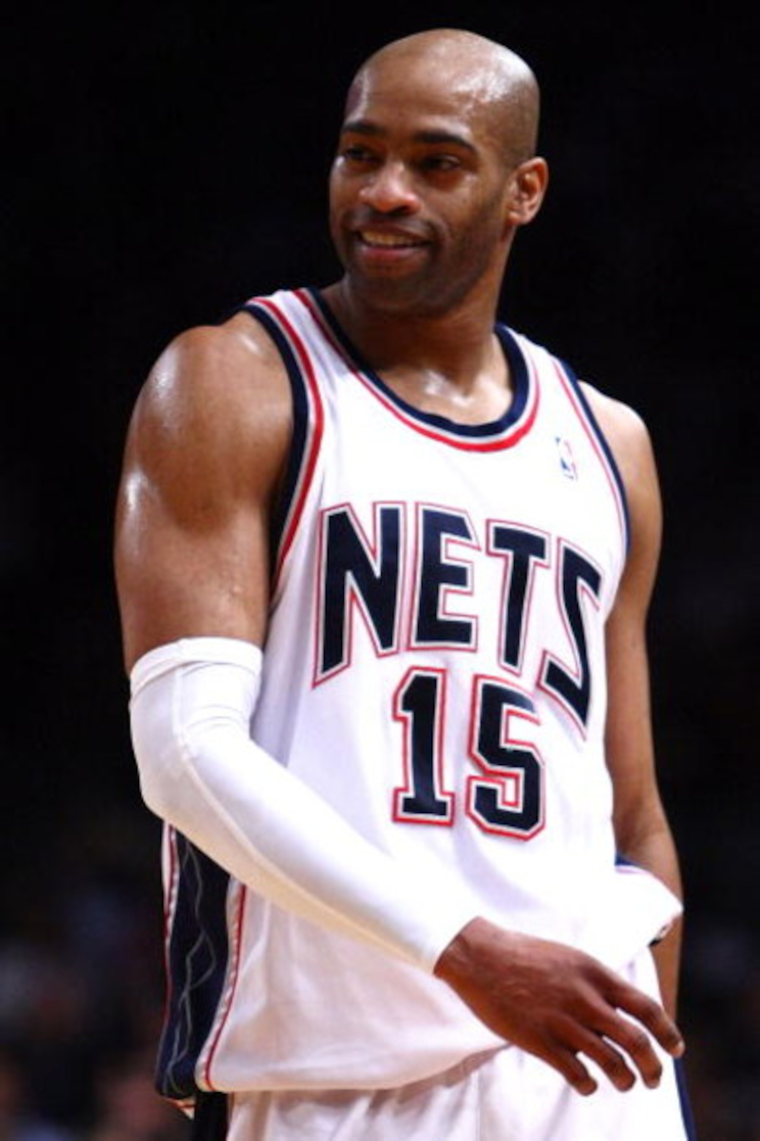 NEW YORK - MARCH 18: Vince Carter #15 of the New Jersey Nets watches on against the New York Knicks at Madison Square Garden March 18, 2009 in New York City. NOTE TO USER: User expressly acknowledges and agrees that, by downloading and/or using this Photo
