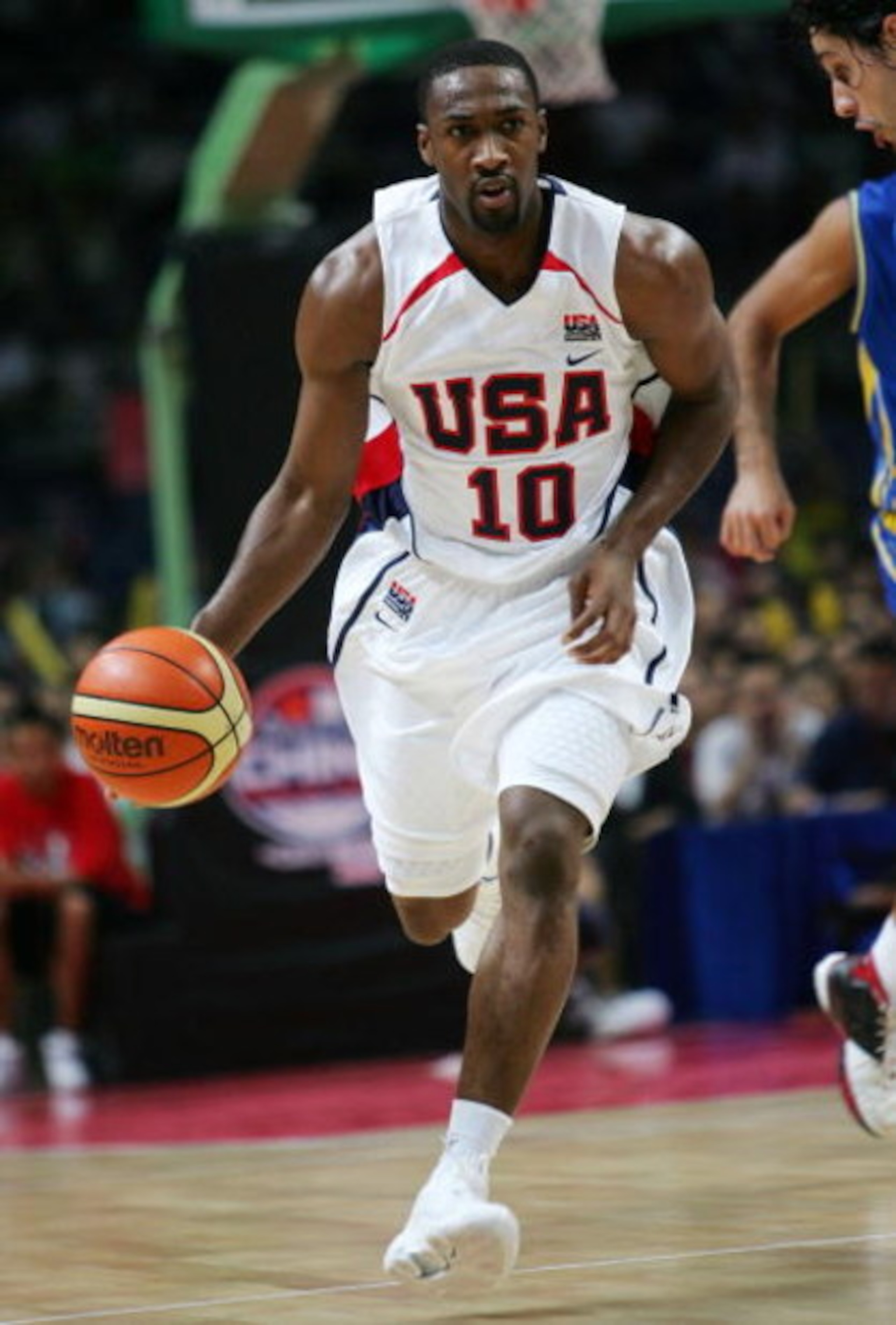 GUANGZHOU, CHINA - AUGUST 8:  Gilbert Arenas of the USA Senior Men's National Team controls the ball against Brazil Men's National Team during the China Basketball Challenge August 8, 2006 in Guangzhou, Guangdong province, China. USA won the game, 90-86. 