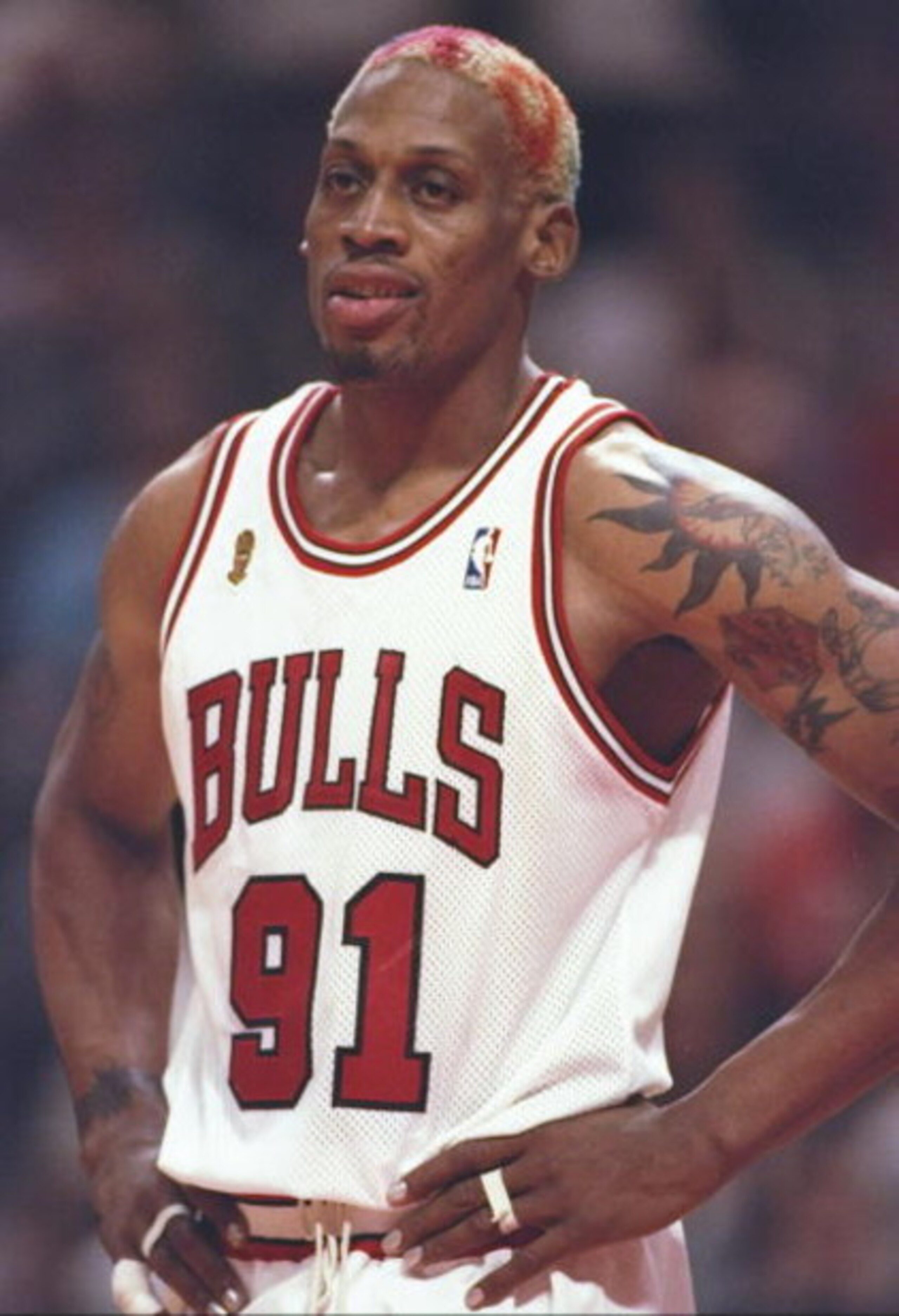 16 Jun 1996:  Forward Dennis Rodman of the Chicago Bulls stands on the court during a playoff game against the Seattle Supersonics at the United Center in Chicago, Illinois.  The Bulls won the game 87-75. Mandatory Credit: Jonathan Daniel  /Allsport
