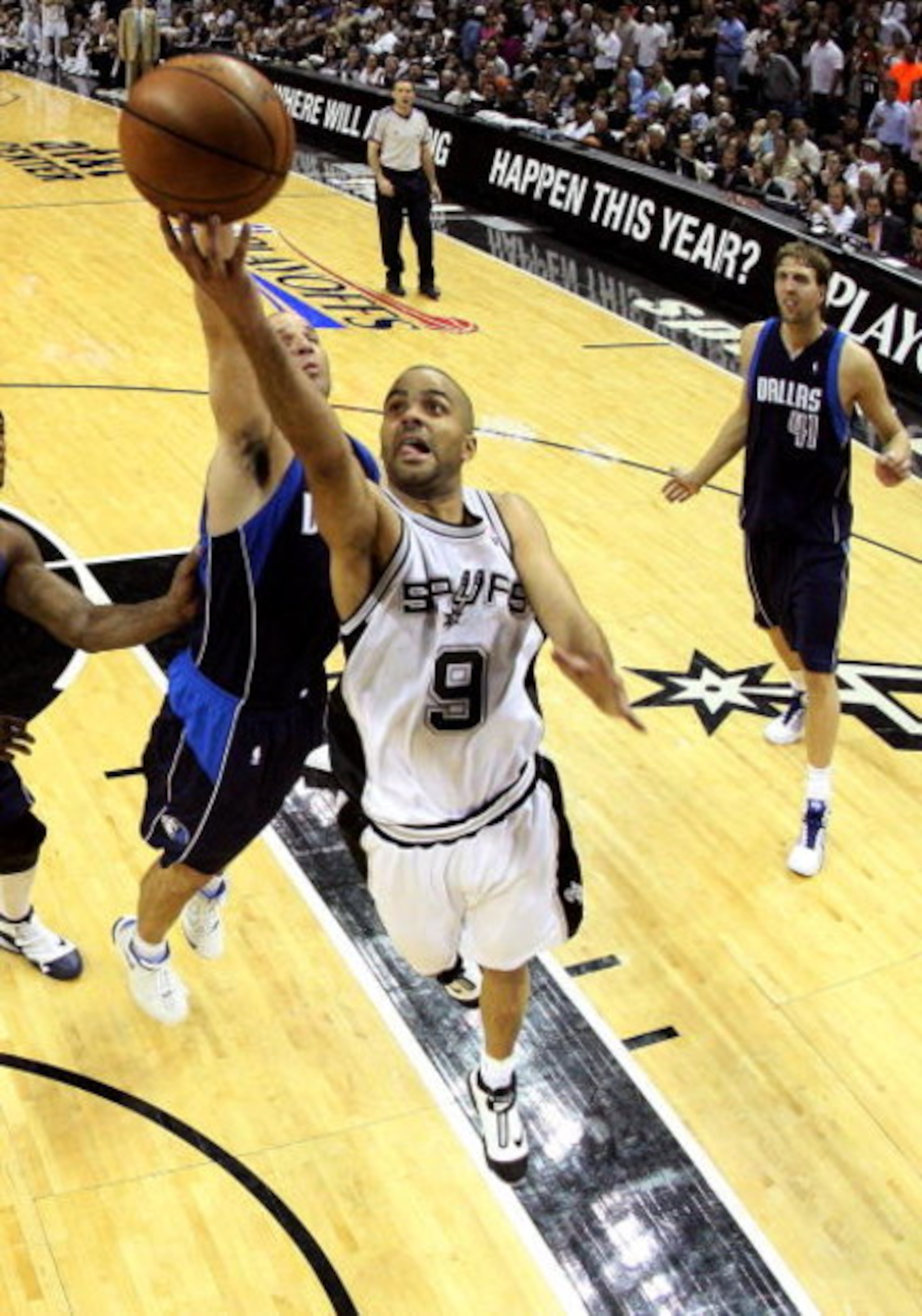 SAN ANTONIO - APRIL 28:  Guard Tony Parker #9 of the San Antonio Spurs takes a shot against Jason Kidd #2 of the Dallas Mavericks in Game Five of the Western Conference Quarterfinals during the 2009 NBA Playoffs at AT&T Center on April 28, 2009 in San Ant