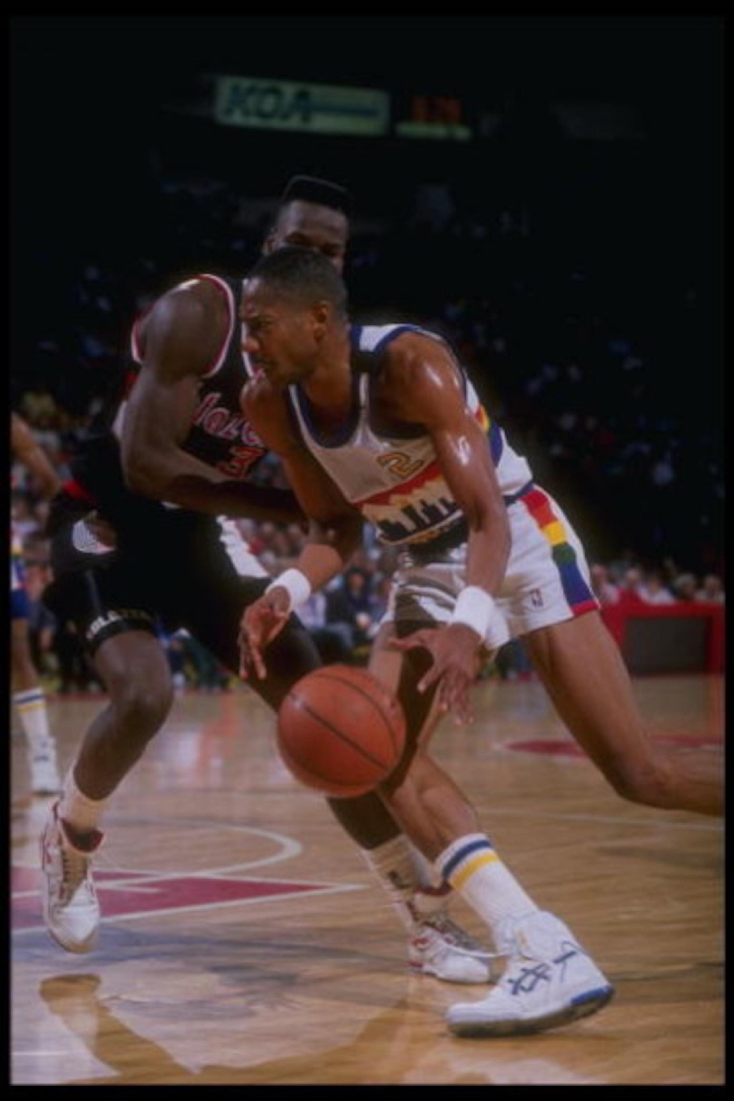 1989-1990:  Guard Alex English of the Denver Nuggets moves the ball during a game versus the Portland Trailblazers at the McNichols Sports Arena in Denver, Colorado. Mandatory Credit: Tim DeFrisco  /Allsport Mandatory Credit: Tim DeFrisco  /Allsport