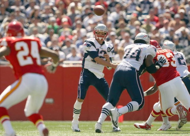 FOXBORO, MA - SEPTEMBER 7:  Quarterback Tom Brady #12 of the New England Patriots passes the ball up the middle during their NFL game against the Kansas City Chiefs on September 7, 2008 at Gillette Stadium in Foxboro, Massachusetts. The Patriots defeated 