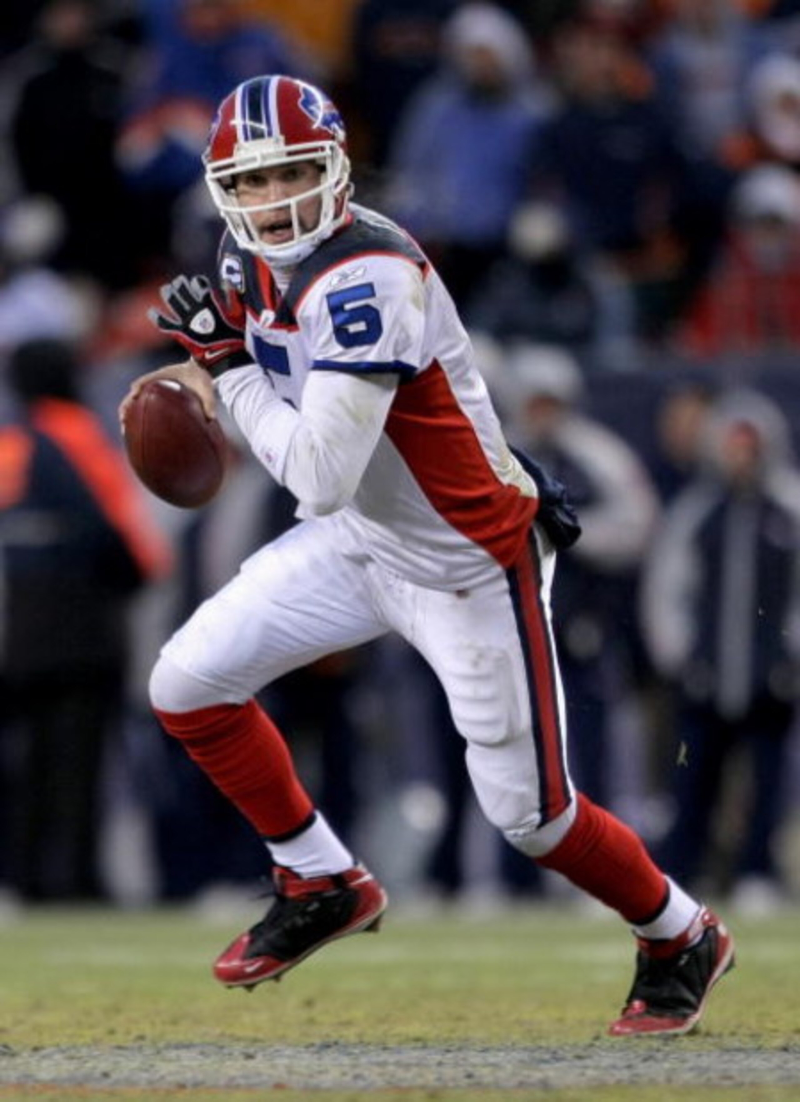 DENVER - DECEMBER 21:  Quarterback Trent Edwards #5 of the Buffalo Bills rolls out and looks for a receiver against the Denver Broncos during NFL action at Invesco Field at Mile High on December 21, 2008 in Denver, Colorado. The Bills defeated the Broncos