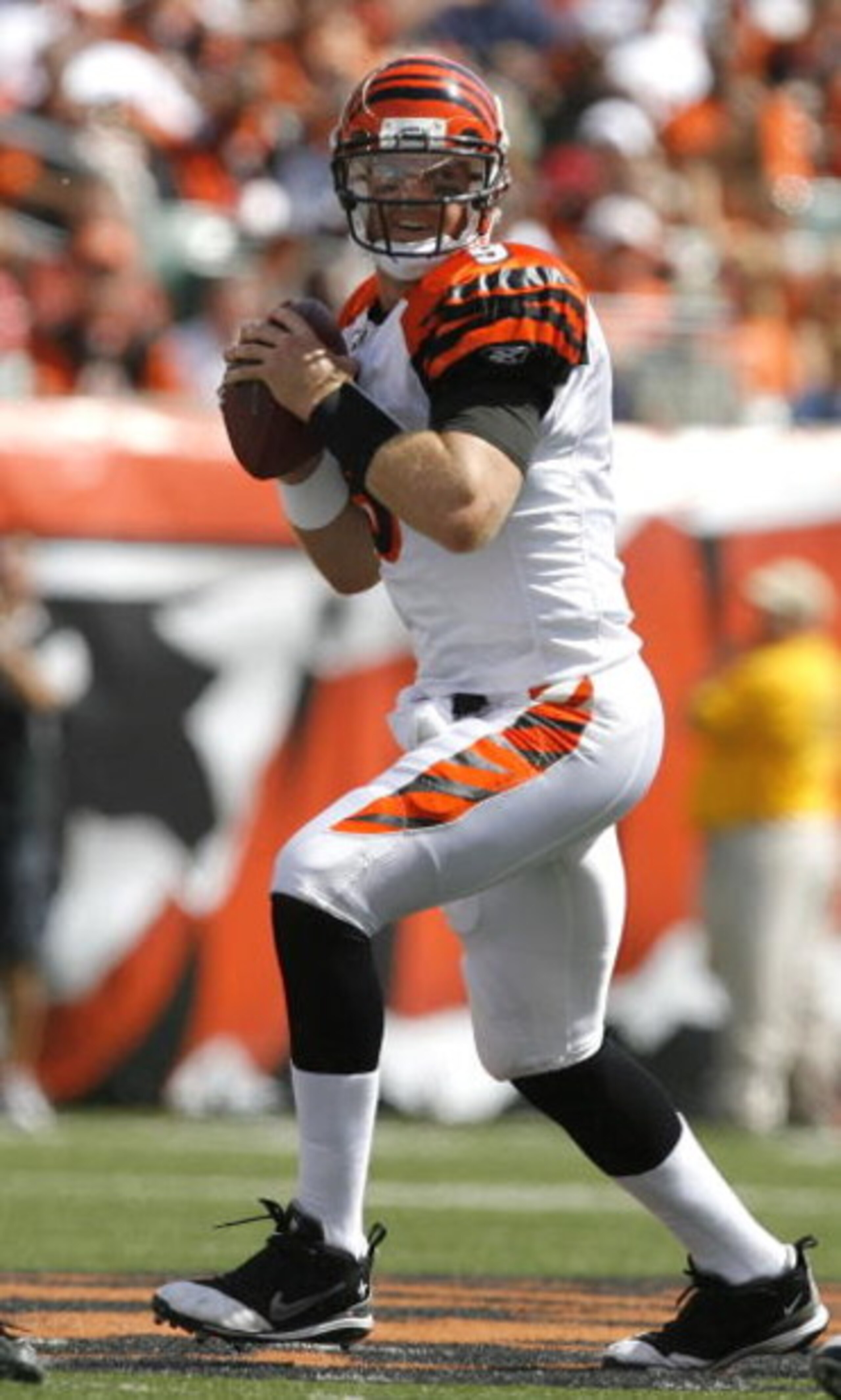 CINCINNATI - SEPTEMBER 14:  Carson Palmer #9 of the Cincinnati Bengals throws the ball against the Tennessee Titans during the first quarter of their NFL game September 14, 2008 at Paul Brown Stadium in Cincinnati, Ohio. The Titans defeated the Bengals 24