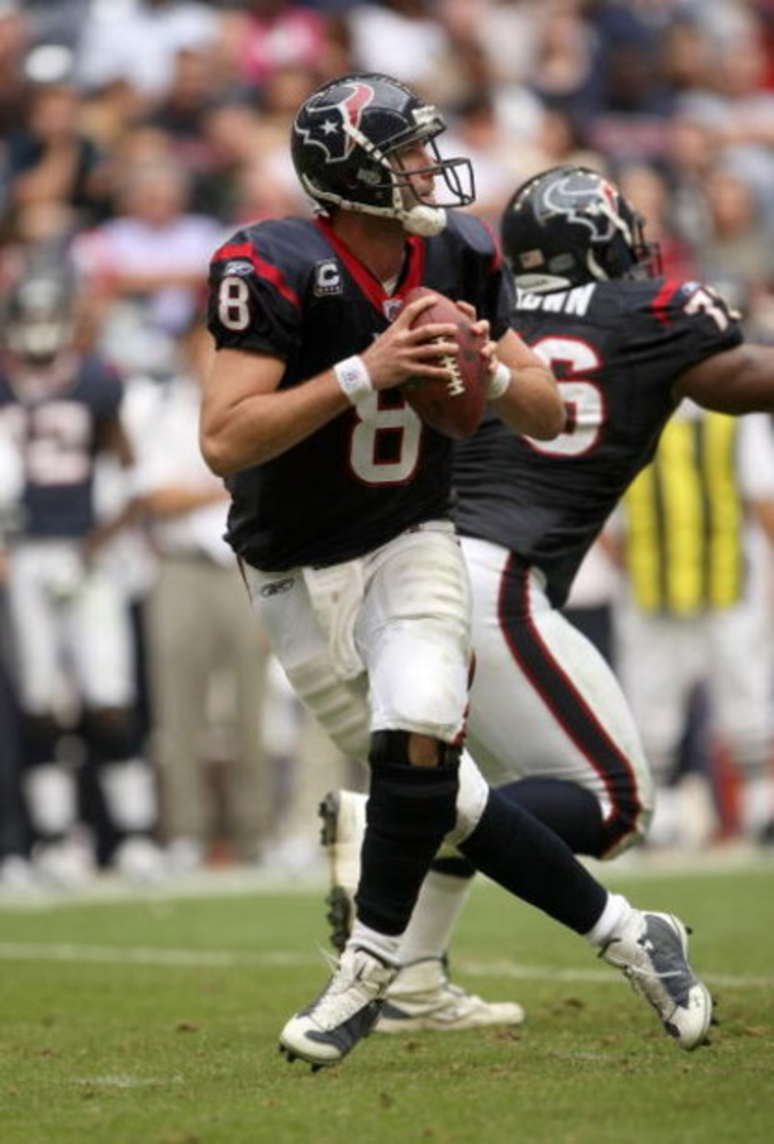 HOUSTON - DECEMBER 14:  Quarterback Matt Schaub #8 of the Houston Texans drops back to pass against the Tennessee Titans on December 14, 2008 at Reliant Stadium in Houston, Texas.  The Texans won 13-12.  (Photo by Stephen Dunn/Getty Images)