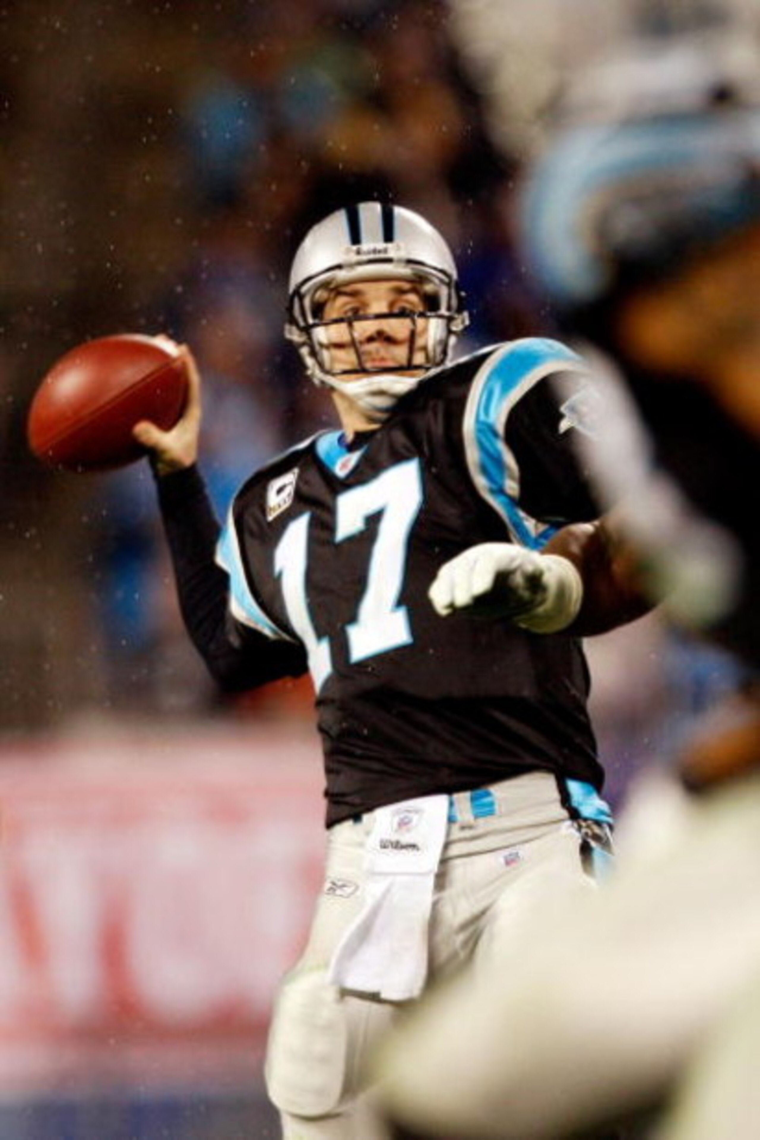 CHARLOTTE, NC - JANUARY 10:  Quarterback Jake Delhomme #17 of the Carolina Panthers passes the ball against the Arizona Cardinals during the NFC Divisional Playoff Game on January 10, 2009 at Bank of America Stadium in Charlotte, North Carolina.  (Photo b