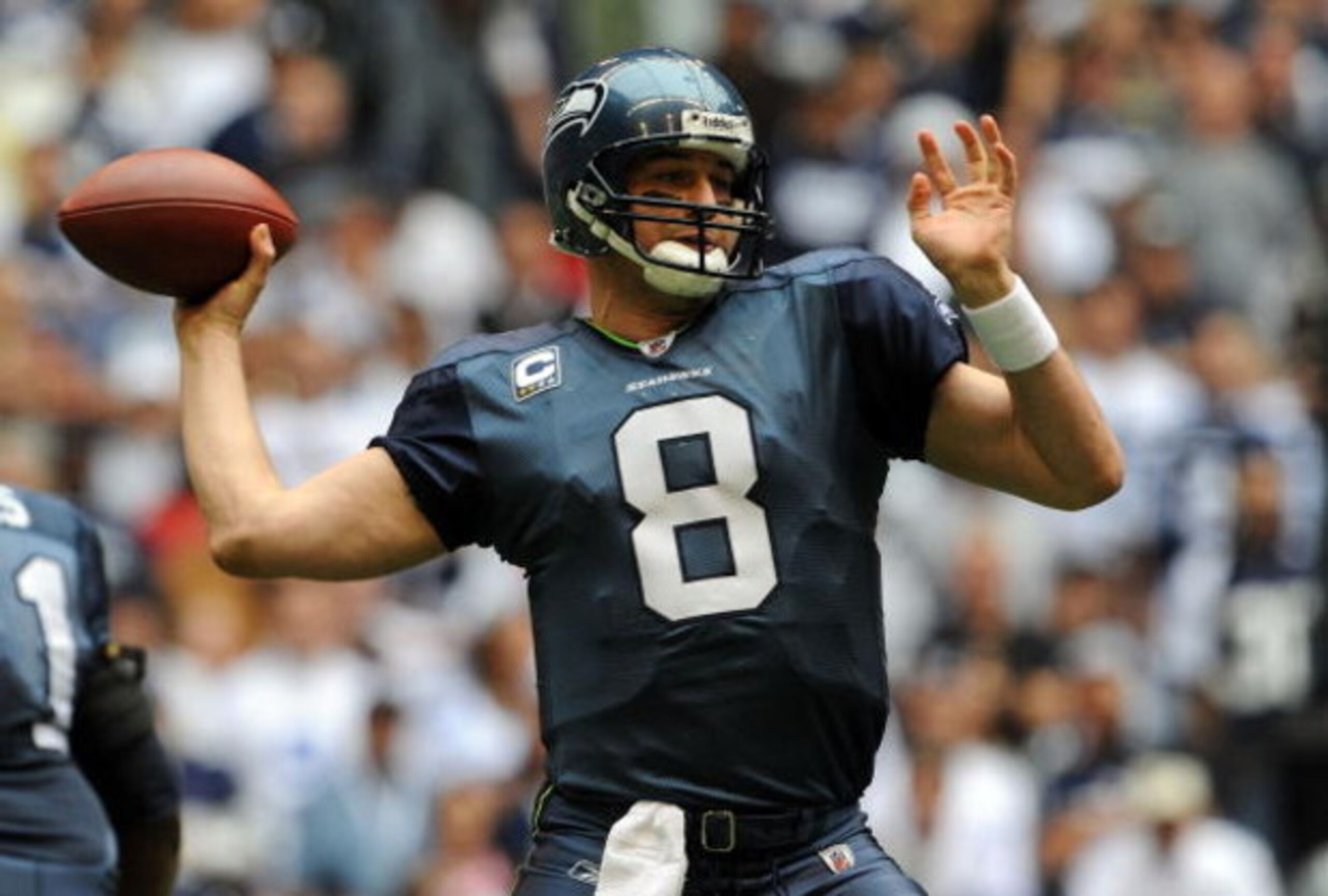 IRVING, TX - NOVEMBER 27:  Quarterback Matt Hasselbeck #8 of the Seattle Seahawks drops back to pass against the Dallas Cowboys in the first quarter at Texas Stadium on November 27, 2008 in Irving, Texas.  (Photo by Ronald Martinez/Getty Images)