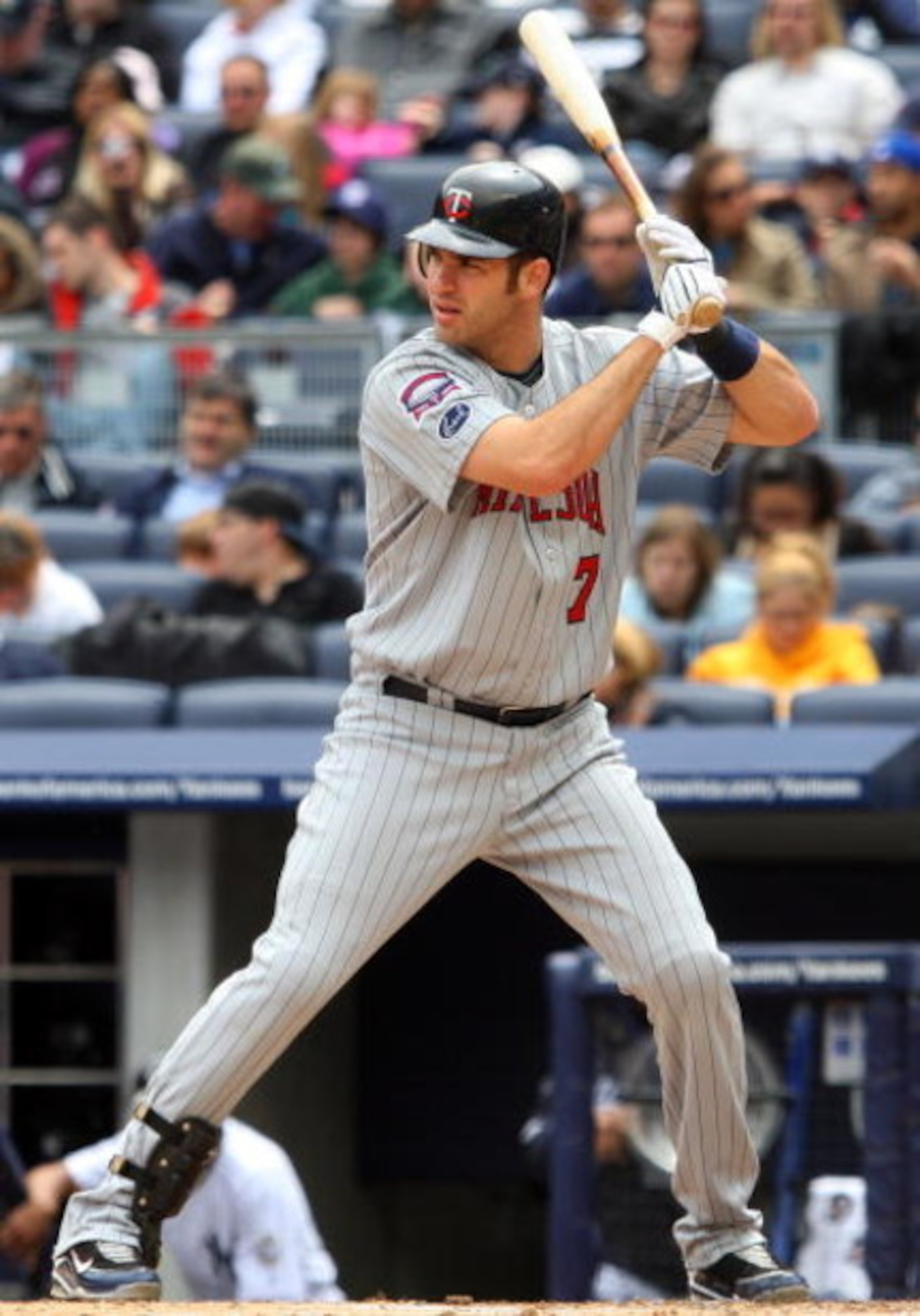 NEW YORK - MAY 17:  Joe Mauer #7 of the Minnesota Twins bats against the New York Yankees on May 17, 2009 at Yankee Stadium in the Bronx borough of New York City. The Yankees defeated the Twins 3-2 in ten innings.  (Photo by Jim McIsaac/Getty Images)