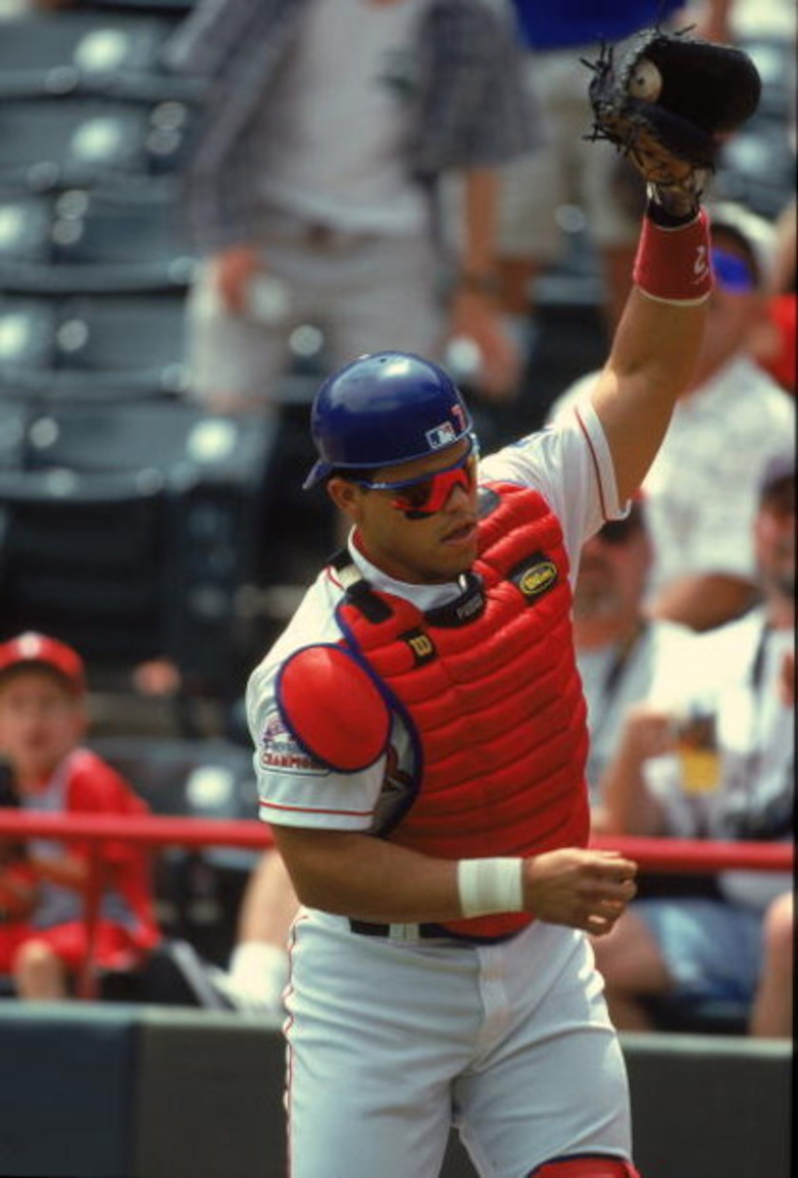 17 May 2000:  Catcher Ivan Rodriguez #7 of the Texas Rangers catches the ball during a game against the Tampa Bay Devil Rays at The Ball Park in Arlington, Texas. The Rangers defeated the Devil Rays 11-6.Mandatory Credit: Chris Covatta  /Allsport
