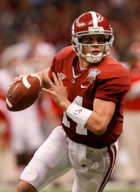 NEW ORLEANS - JANUARY 02:  Quarterback John Parker Wilson #14 of the Alabama Crimson Tide rolls out of the pocket in the second quarter while taking on the Utah Utes during the 75th Allstate Sugar Bowl at the Louisiana Superdome on January 2, 2009 in New 