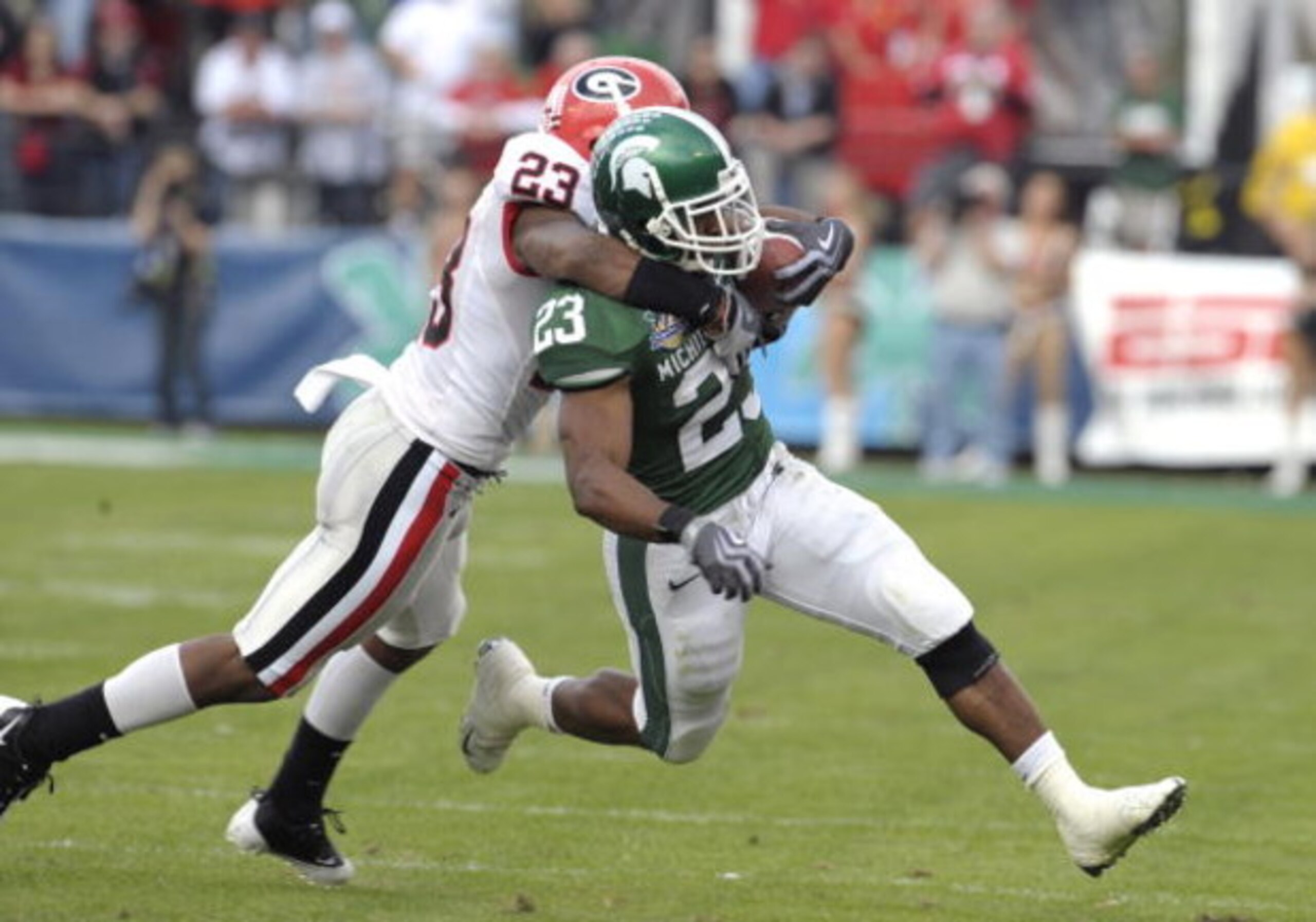 ORLANDO, FL - JANUARY 1: Running back Javon Ringer #23 of the Michigan State Spartans rushes upfield against the Georgia Bulldogs at the 2009 Capital One Bowl at the Citrus Bowl on January 1, 2009 in Orlando, Florida.  (Photo by Al Messerschmidt/Getty Ima