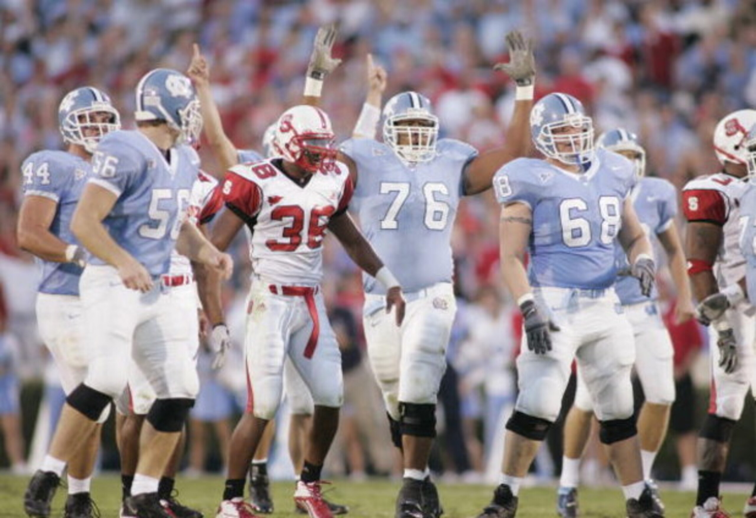 CHAPEL HILL, NC - OCTOBER 9:  The North Carolina Tar Heels celebrate during the game against the North Carolina State Wolfpack on October 9, 2004 at Kenan Stadium Stadium in Chapel Hill, North Carolina. North Carolina defeated North Carolina State 30-24. 