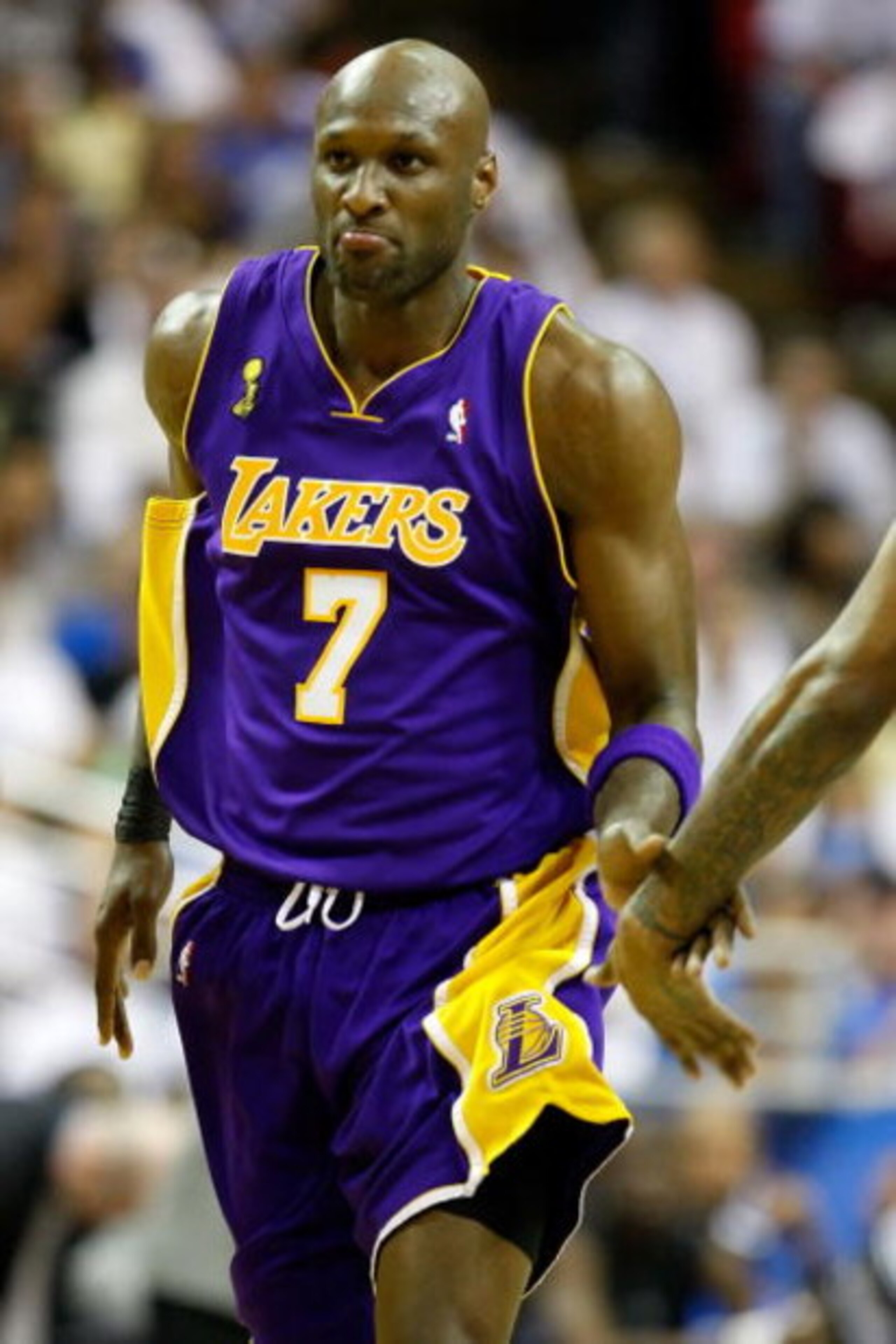 ORLANDO, FL - JUNE 14:  Lamar Odom #7 of the Los Angeles Lakers reacts in the third quarter against the Orlando Magic in Game Five of the 2009 NBA Finals on June 14, 2009 at Amway Arena in Orlando, Florida.  NOTE TO USER:  User expressly acknowledges and 