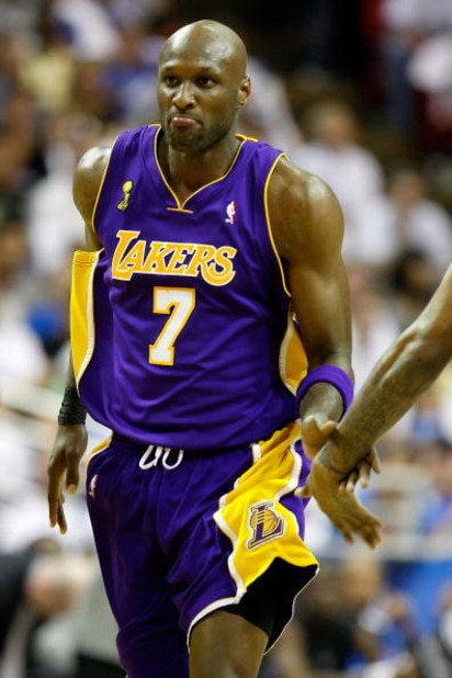 ORLANDO, FL - JUNE 14:  Lamar Odom #7 of the Los Angeles Lakers reacts in the third quarter against the Orlando Magic in Game Five of the 2009 NBA Finals on June 14, 2009 at Amway Arena in Orlando, Florida.  NOTE TO USER:  User expressly acknowledges and 