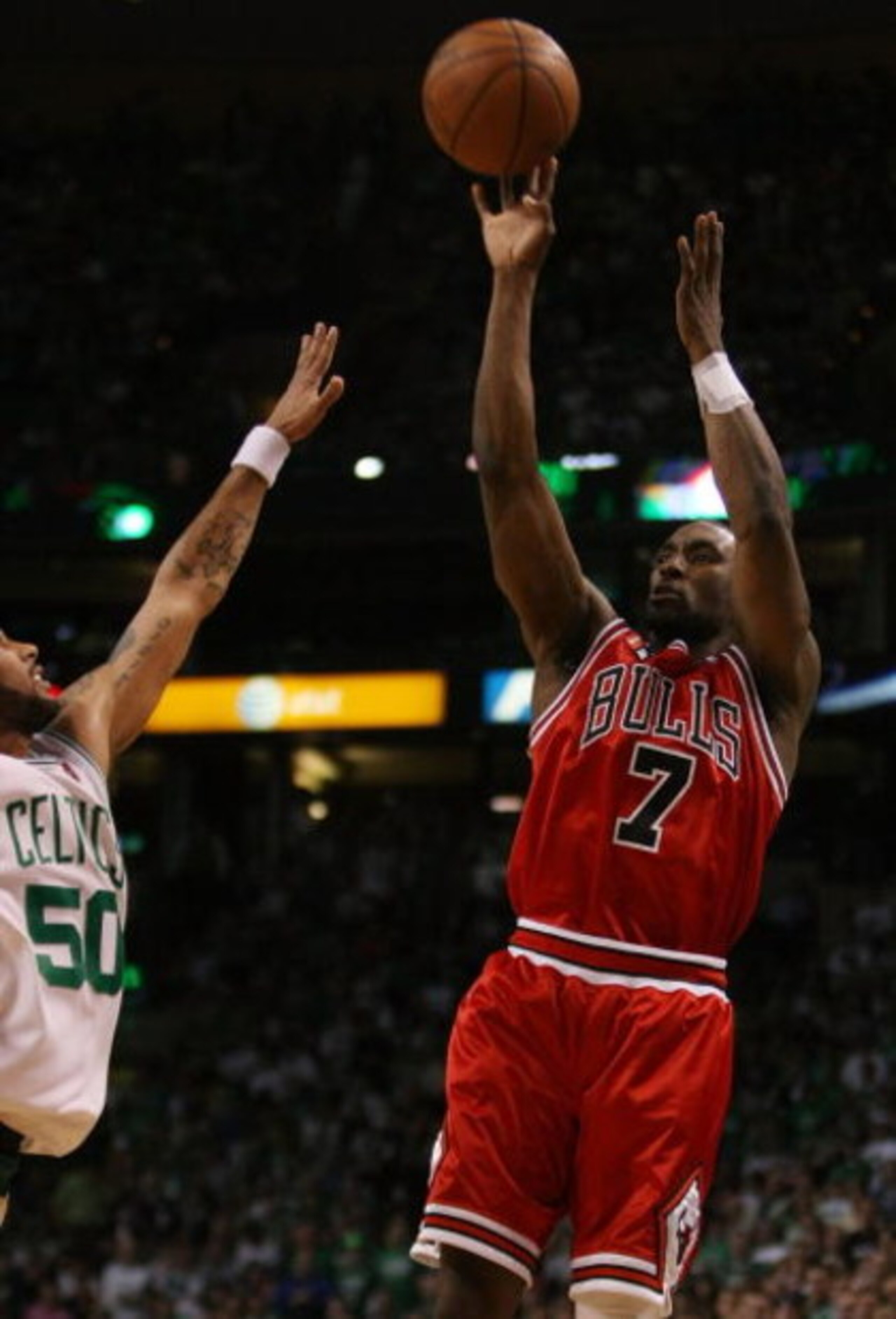 BOSTON - MAY 02:  Ben Gordon #7 of the Chicago Bulls takes a shot as Eddie House #50 of the Boston Celtics defends in Game Seven of the Eastern Conference Quarterfinals during the 2009 NBA Playoffs at TD Banknorth Garden on May 2, 2009 in Boston, Massachu