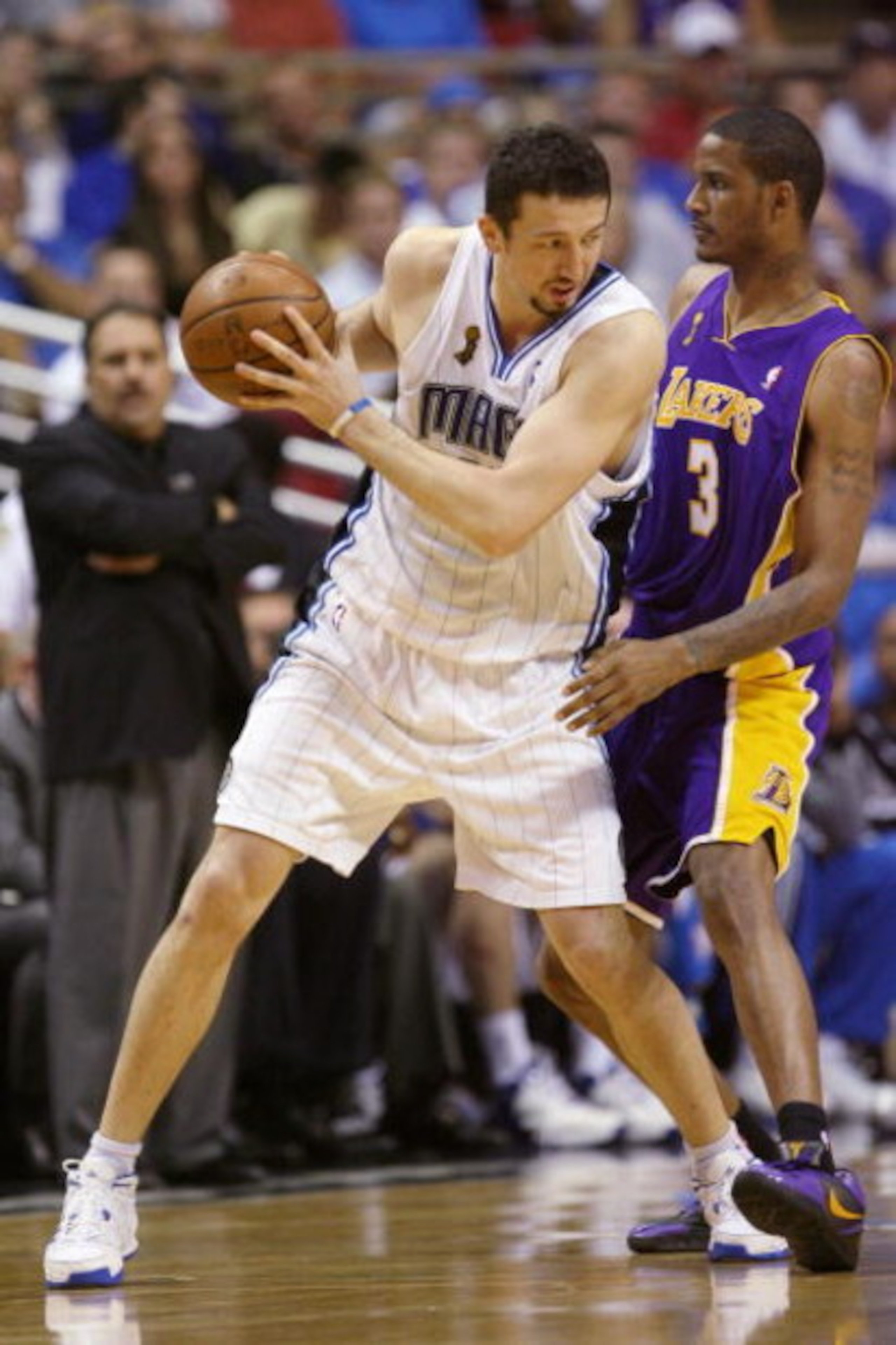 ORLANDO, FL - JUNE 11:  Hedo Turkoglu #15 of the Orlando Magic looks to make a move against Trevor Ariza #3 of the Los Angeles Lakers in Game Four of the 2009 NBA Finals at Amway Arena on June 11, 2009 in Orlando, Florida.  The Lakers won 99-91 in overtim