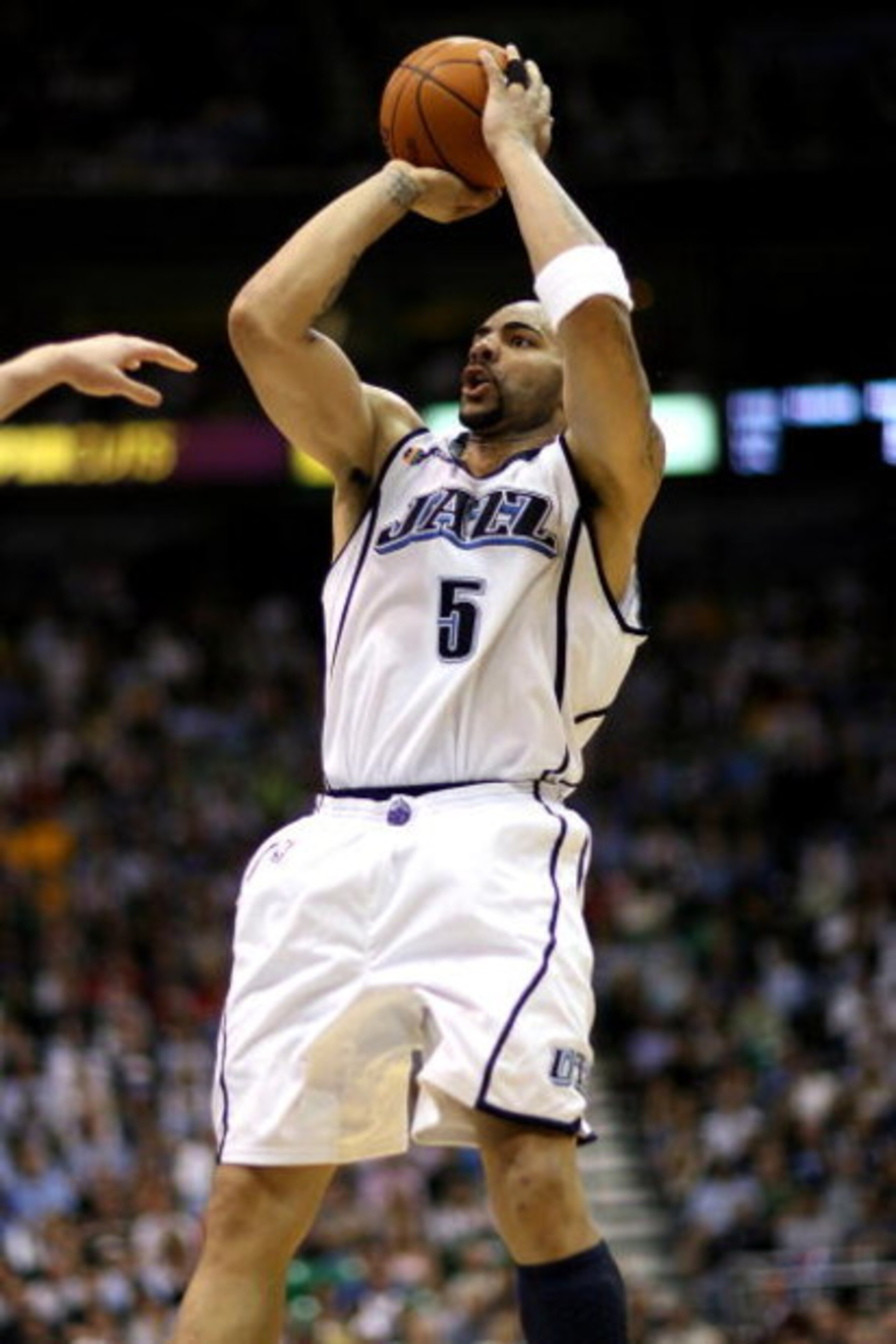 SALT LAKE CITY - APRIL 25:  Carlos Boozer #5 of the Utah Jazz shoots in Game Four of the Western Conference Quarterfinals against the Los Angeles Lakers during the 2009 NBA Playoffs at Energy Solutions Arena on April 25, 2009 in Salt Lake City, Utah.  The